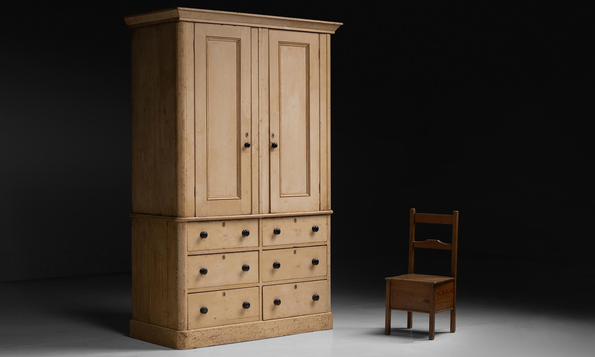Massive Housekeepers Cupboard

England circa 1840

Original period paint, constructed in pine. Six large deep drawers with spacious cupboard above.

Measures 63”w x 31”d x 99.5”h