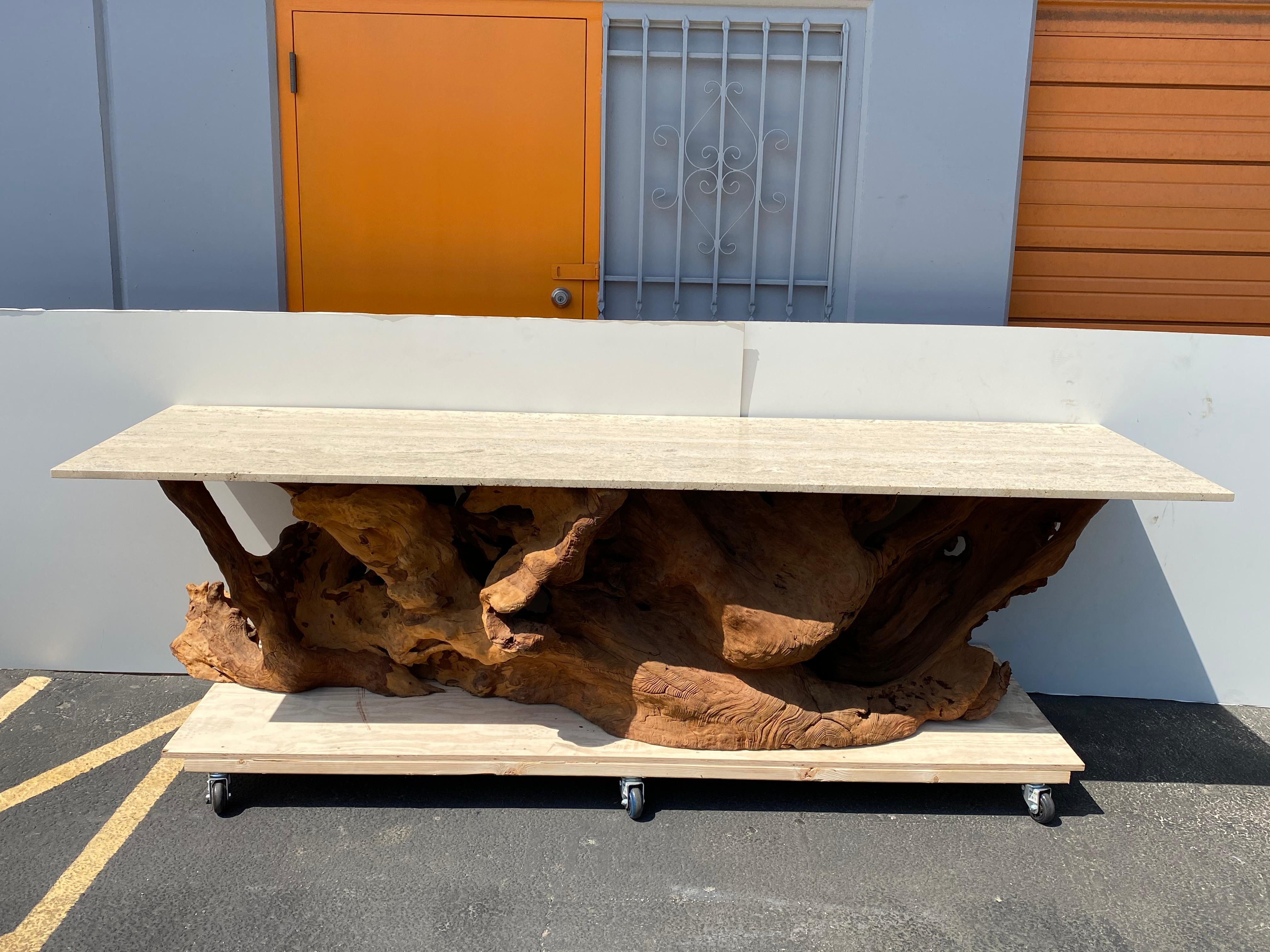 Massive tropical jacaranda teak root dining / console table with travertine top. Root base measures 113
