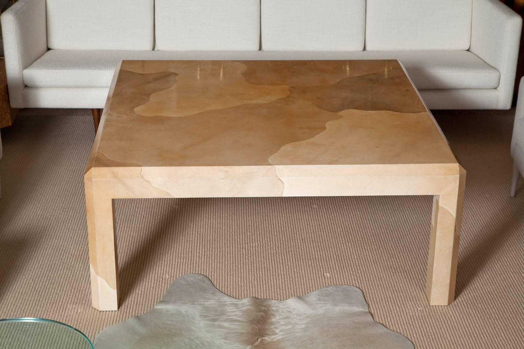 Exceptionally large, late 1970s Karl Springer parchment cocktail table in three colors of goatskin, in good original vintage condition. A few small age appropriate imperfections and surface scratches from use.