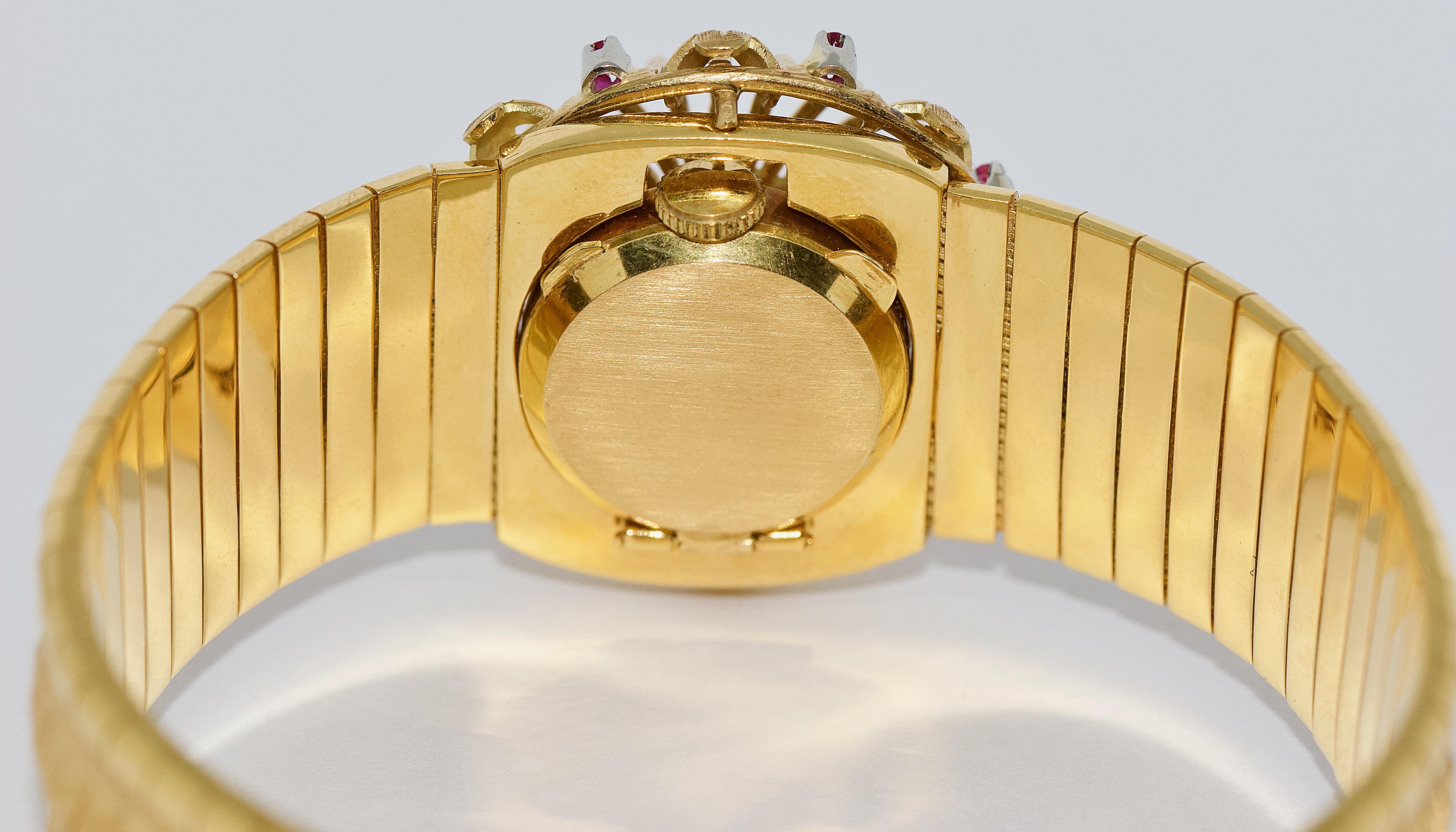 Massive Damenarmbanduhr, Armband, 18 Karat Gold, mit Rubinen und Smaragden im Angebot 1