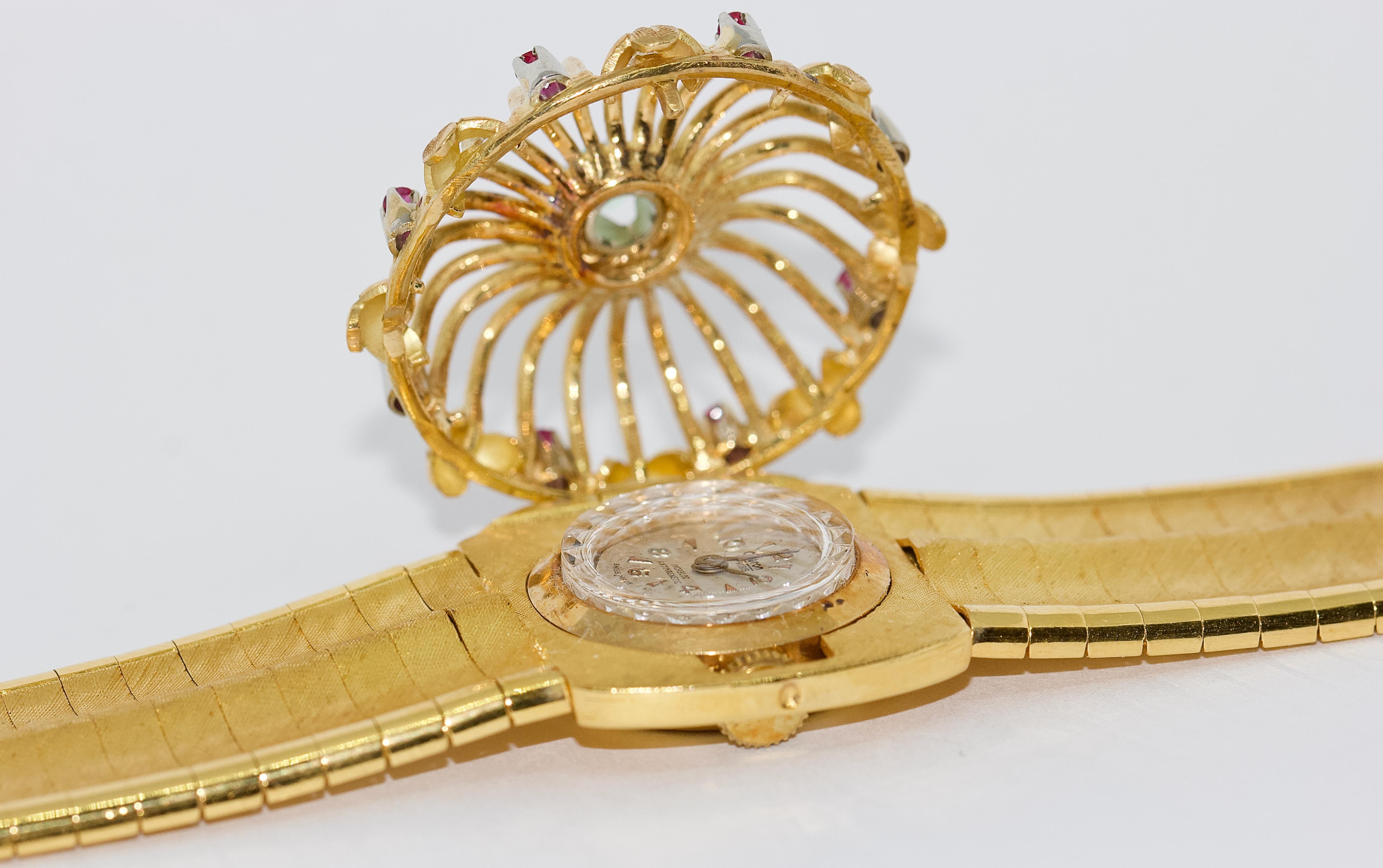 Massive Ladies Wristwatch, Bracelet, 18 Karat Gold, with Rubies and Emerald For Sale 1