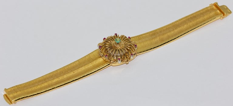 Massive Ladies Wristwatch, Bracelet, 18 Karat Gold, with Rubies and Emerald For Sale 4