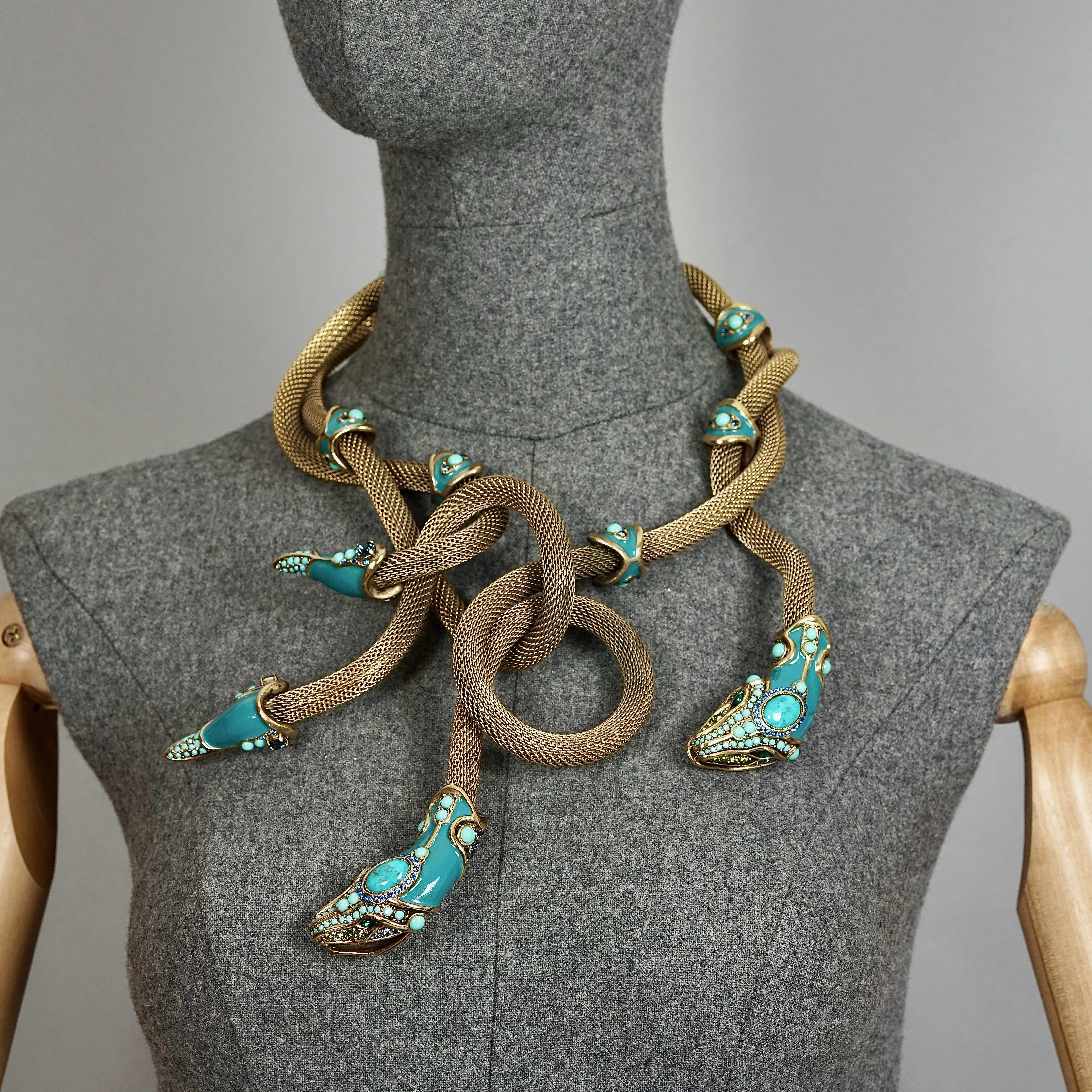 Massive LANVIN Spring 2010 Enamel Snake Coiled Medusa Necklace

Measurement:
Height: 5.51 inches (14 cm)
Wearable Length: 15.35 inches (39 cm) to 16.53 inches (42 cm)

Features:
- 100% Authentic LANVIN Paris.
- Massive necklace with coiled snake