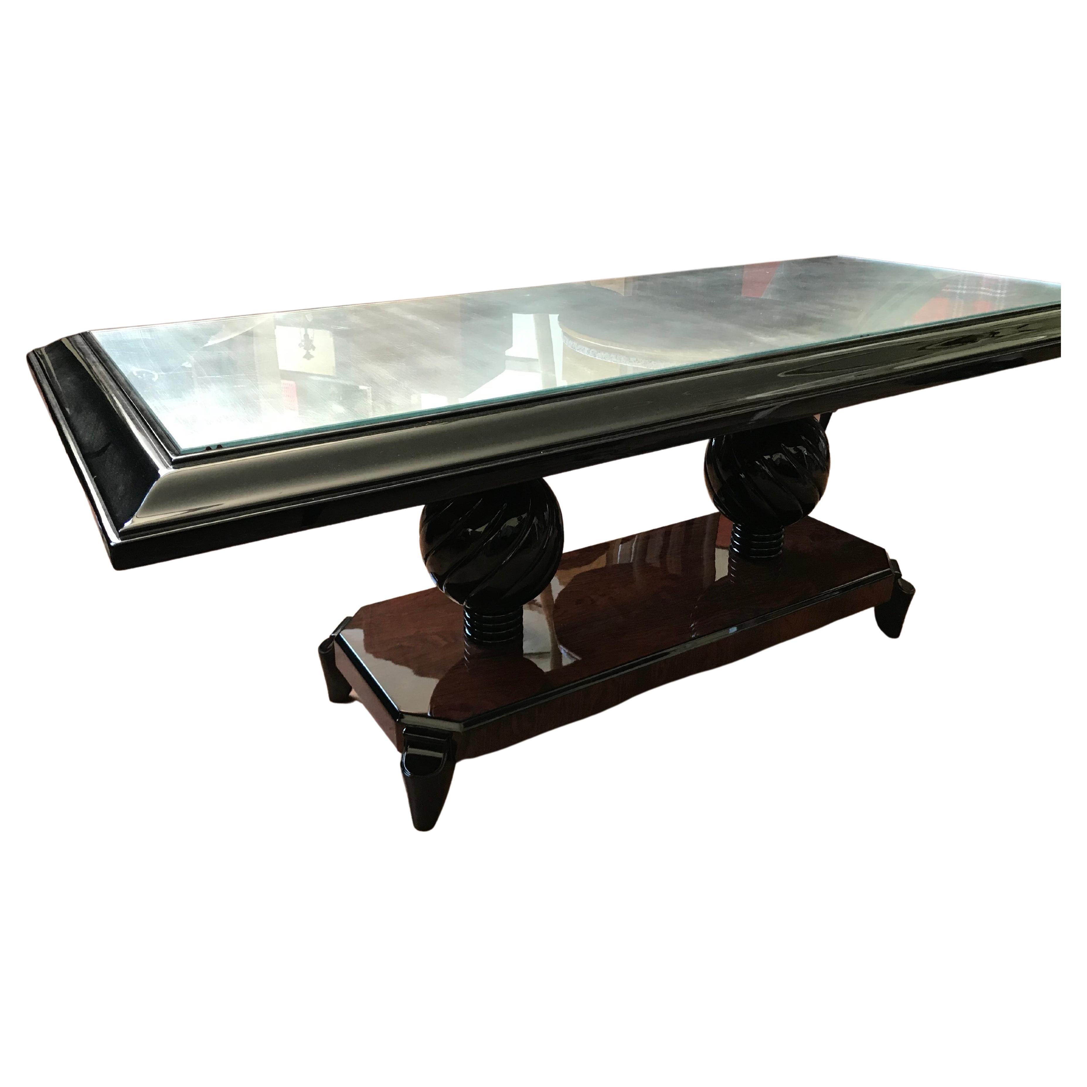  Massive large rectangular French Art Deco coffeetable, sofa table by Souyeux, Ebenist from Nay, South of France. 
Makassar veneer. Black lacquer. New spear glass. Professionally restored. Documented. Gazette Drouot.
Very solid quality.