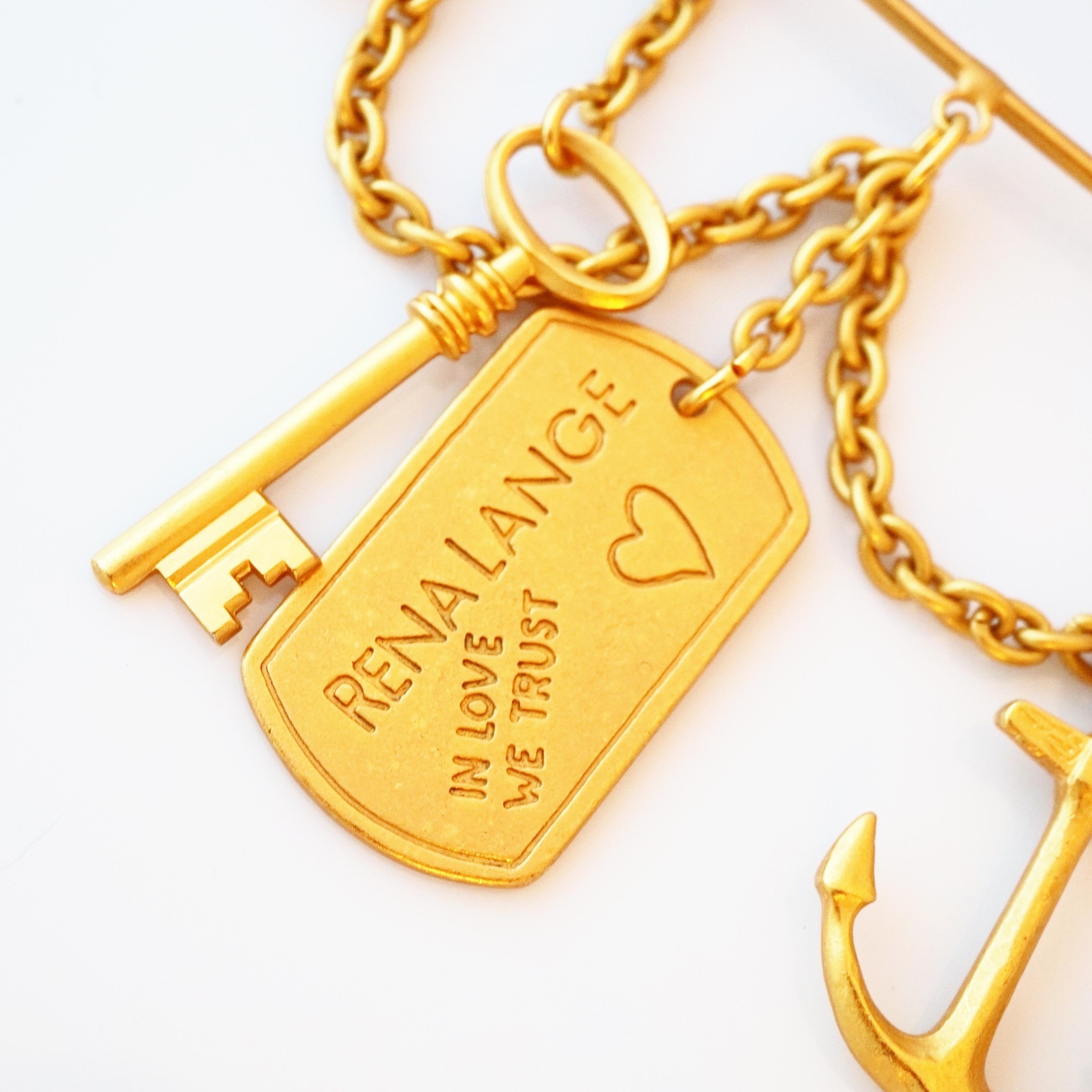 Modern Massive Matte Gold Safety Pin Charm Brooch By Rena Lange, 1990s For Sale