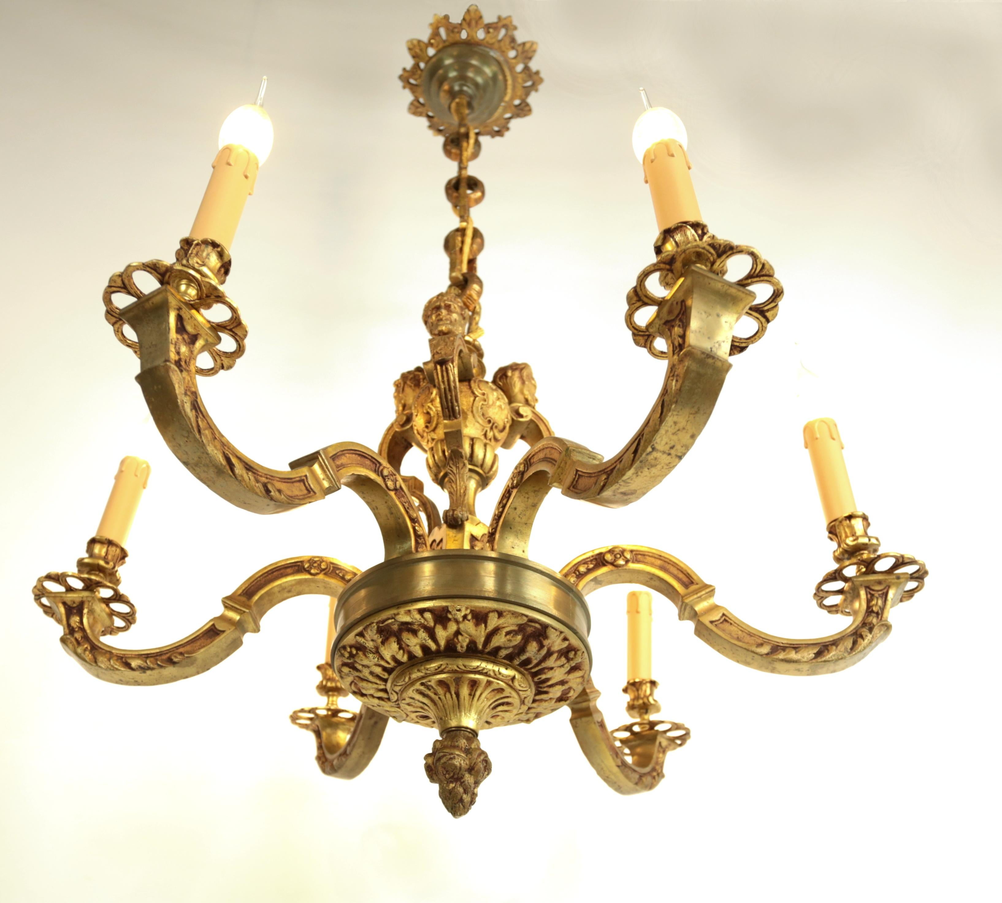 Massive Mazarin bronze chandelier

A heavy six-armed bronze chandelier in the style of Louis XIV. Elaborated in detail. The chandelier was made in France, probably by a workshop in Avignon. Each arm is for one classic candle bulb with an E14 socket