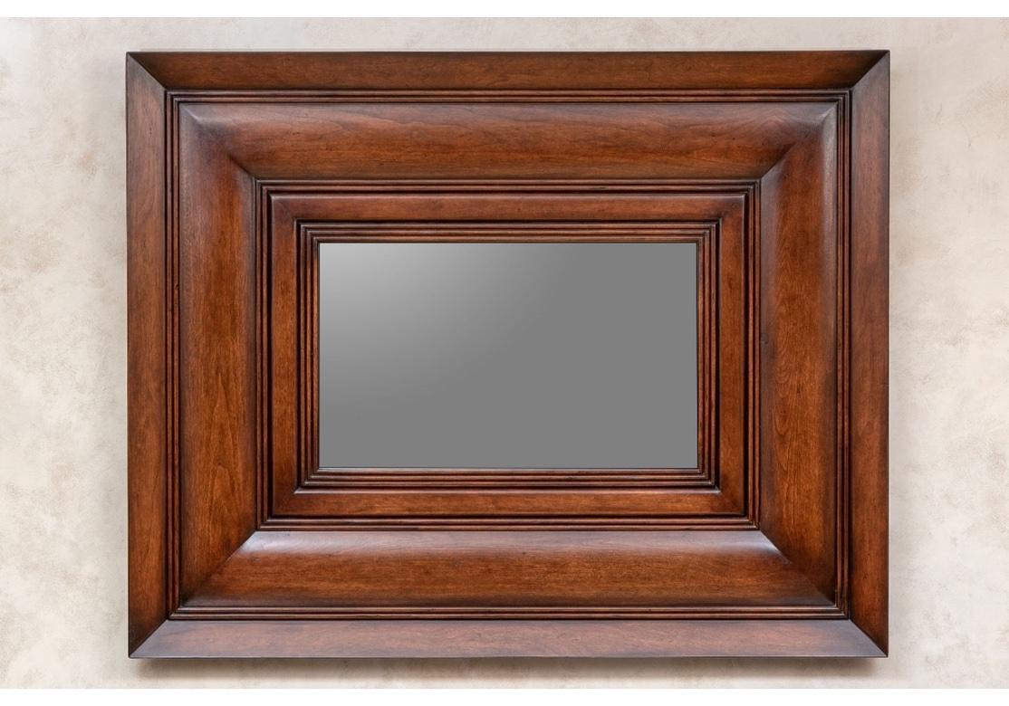 A massive and elemental tiered wood wall mirror by Mclain Wiesand, Custom Furniture and Decorative Arts, Baltimore, Md. With intentionally oxidized Mercury glass and Wood distressing. 
Dimensions: 
Frame - 48
