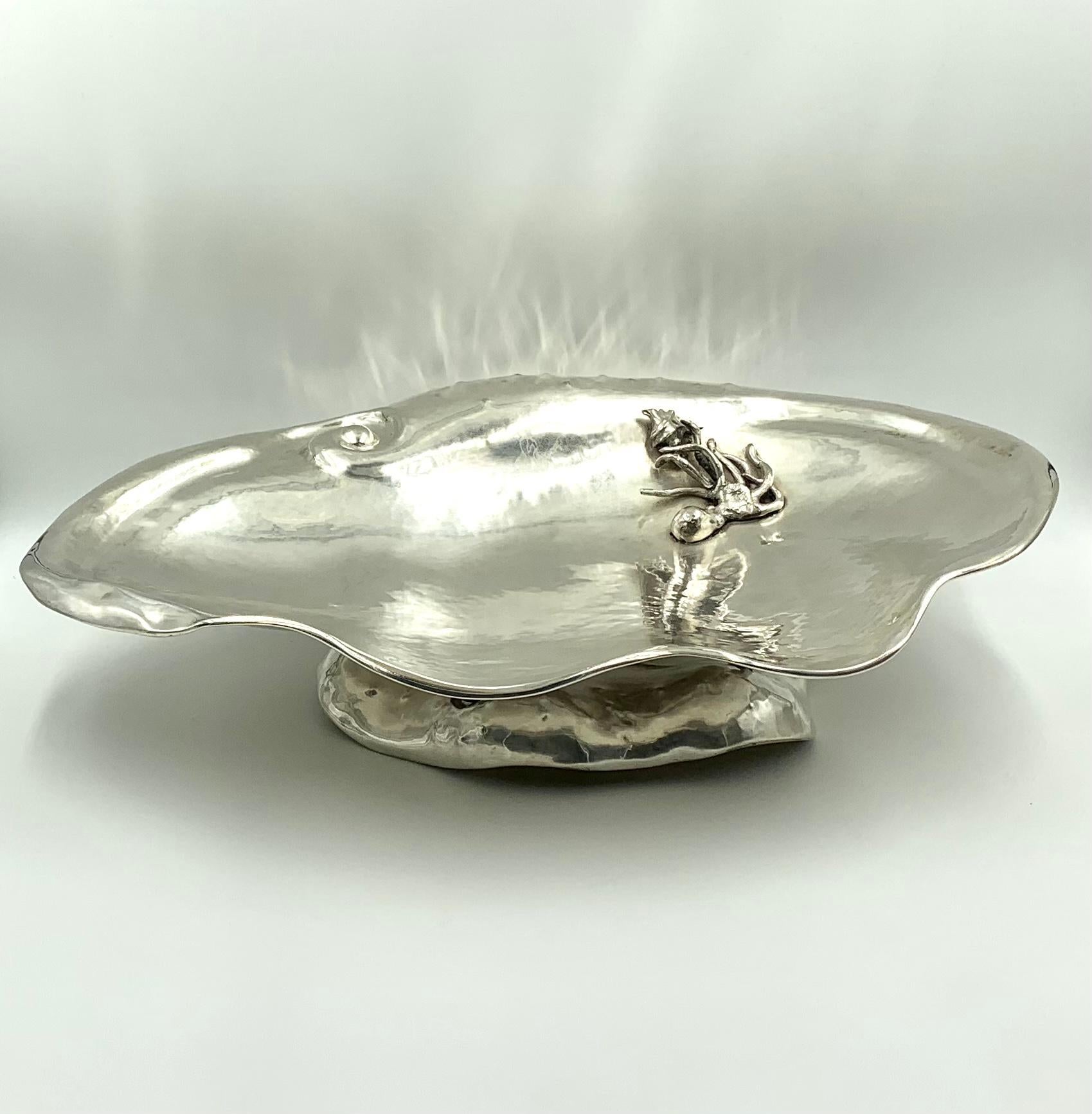 Spectacular, very large MCM Italian silver giant clam shell centerpiece. 
Fabulous for serving oysters, lobster, calamari and other Frutti di Mare. 
Hand hammered, finely hand chased, superb quality on par with Buccellati. Marvelous sculptural