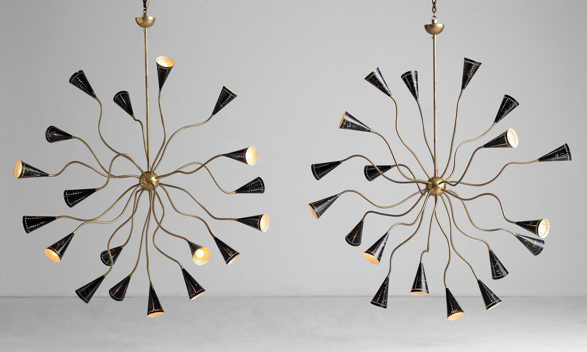 *Please note the price is per unit, and the lights are sold individually*

Massive ‘Medusa’ Chandelier

Italy circa 1960

Perforated black metal shades on adjustable brass arms.

Measures: 60”diameter x 72”h (as shown).