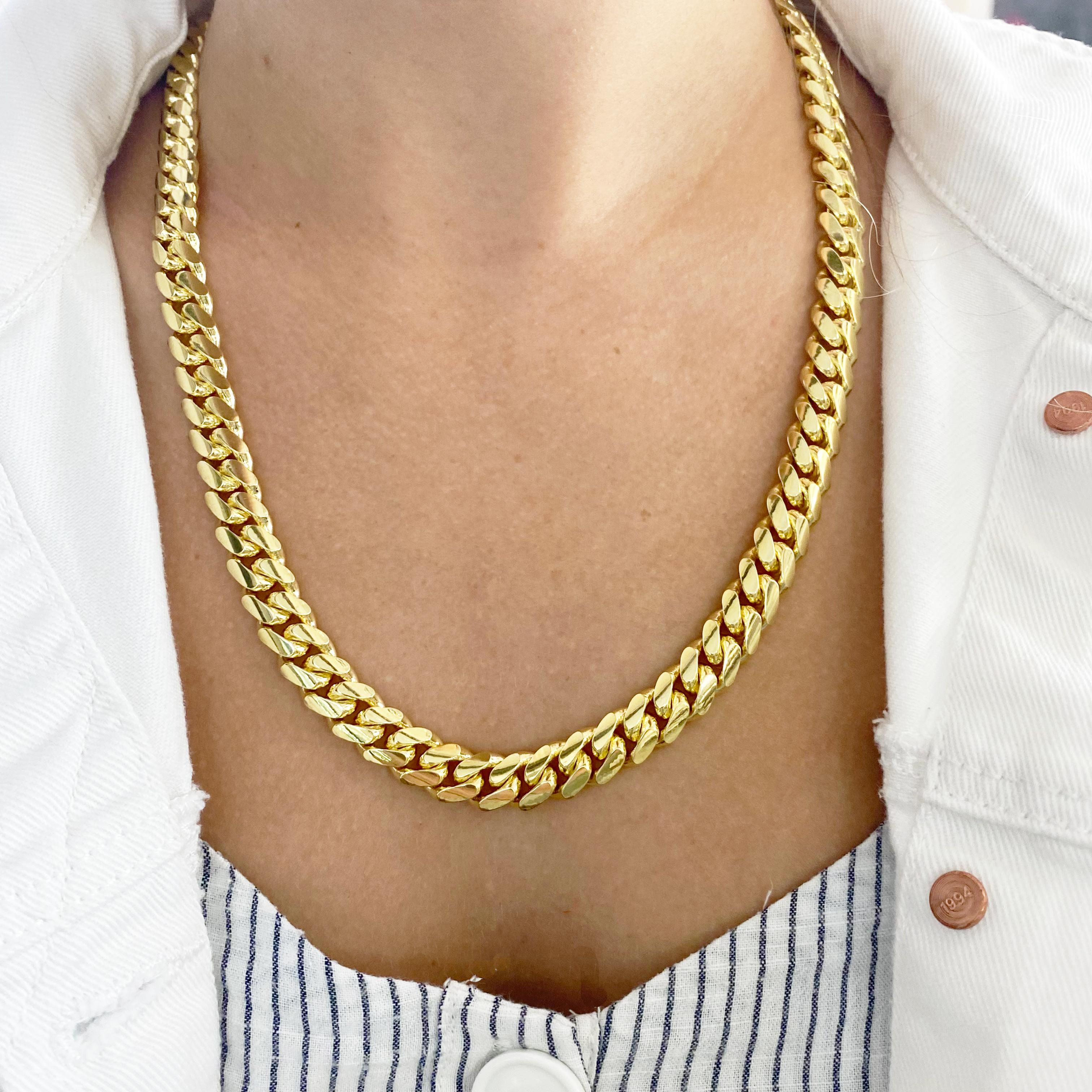 This XL Miami Cuban Chain is perfect for a bold statement. It is 10 millimeters wide and weighs 185.5 grams and extremely heavy and solid 14 karat yellow gold. It has an amazing hidden box clasp with a safety chain. Look like a professional with