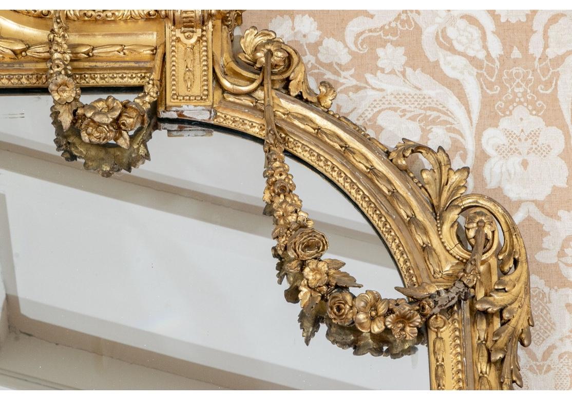 Massive Mid 19th C. Carved and Gilt Mantle Mirror with Putti Crest In Good Condition For Sale In Bridgeport, CT