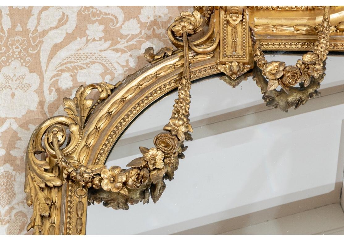 Wood Massive Mid 19th C. Carved and Gilt Mantle Mirror with Putti Crest For Sale