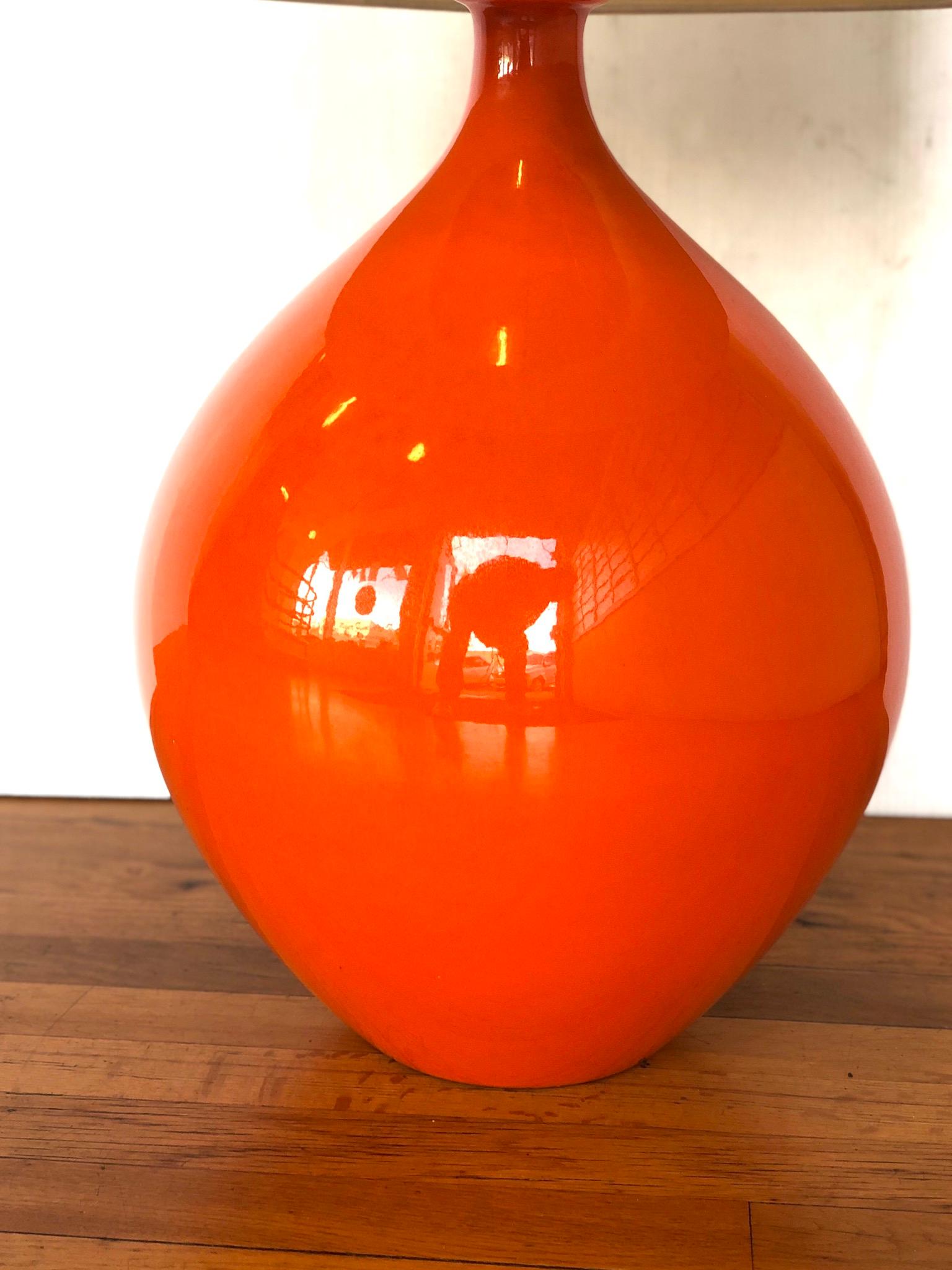 Beautiful orange ceramic lamp hard to find in great condition, no chips or cracks working, lampshade it’s not included, circa 1960s this beauty makes a statement anywhere you place it. Thelma its 22' tall to the top of the socket plus the arp and