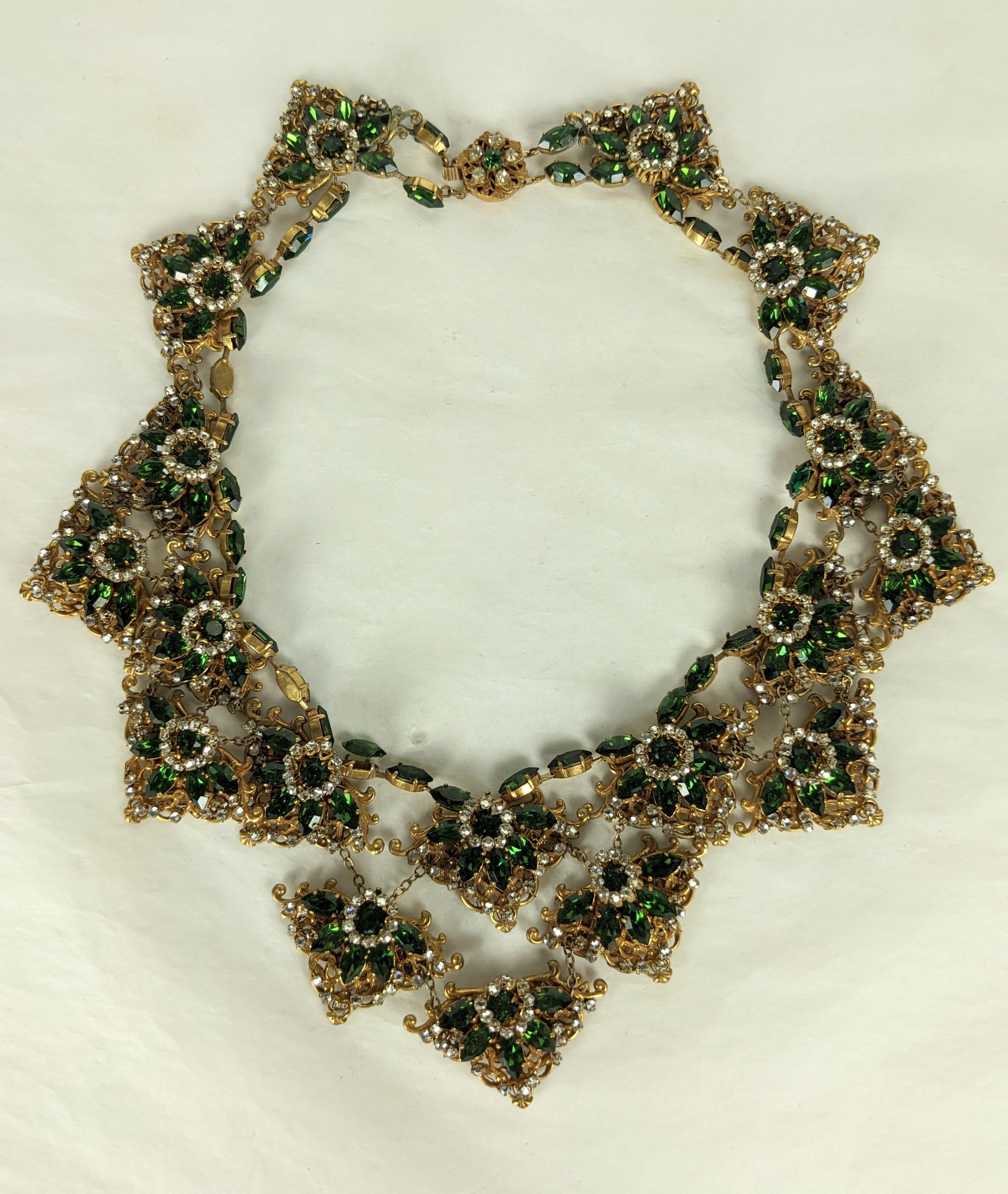 Impressive and Massive Miriam Haskell Bib of Olivine and Crystal Rose Montees from the 1950's. Triangular filigrees in Russian Gilt are sewn with olivine navettes and rose montee crystals. Each central floret has a olivine center with crystal
