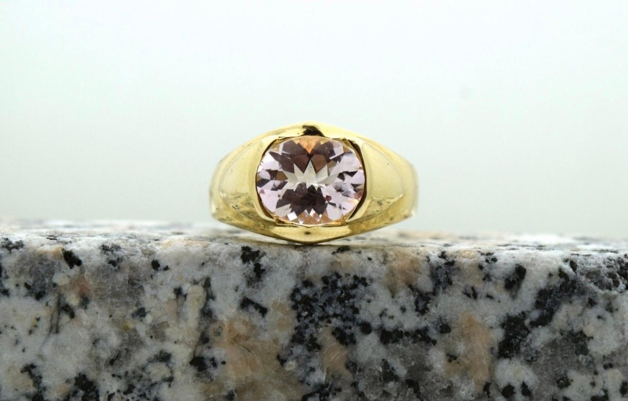 Fantastic ring masculine design offset by a light and elegant morganite in the center, made in 18KT yellow gold in size 10, can be re-sized.

Certificate of authenticity comes with purchase!

ABOUT US
We are a family-owned business. Our studio in
