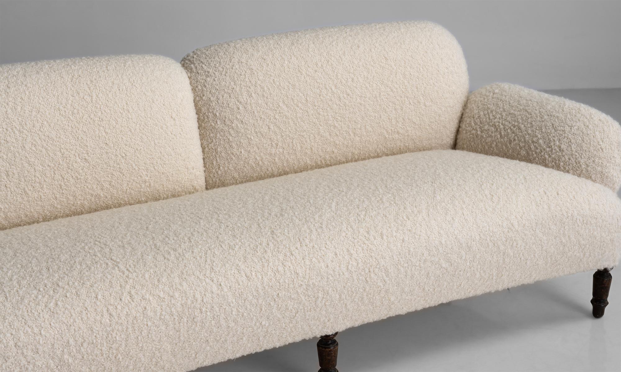 Turned Massive Napoleon III Sofa Covered in Pierre Frey Ivory Boucle, France Circa 1870