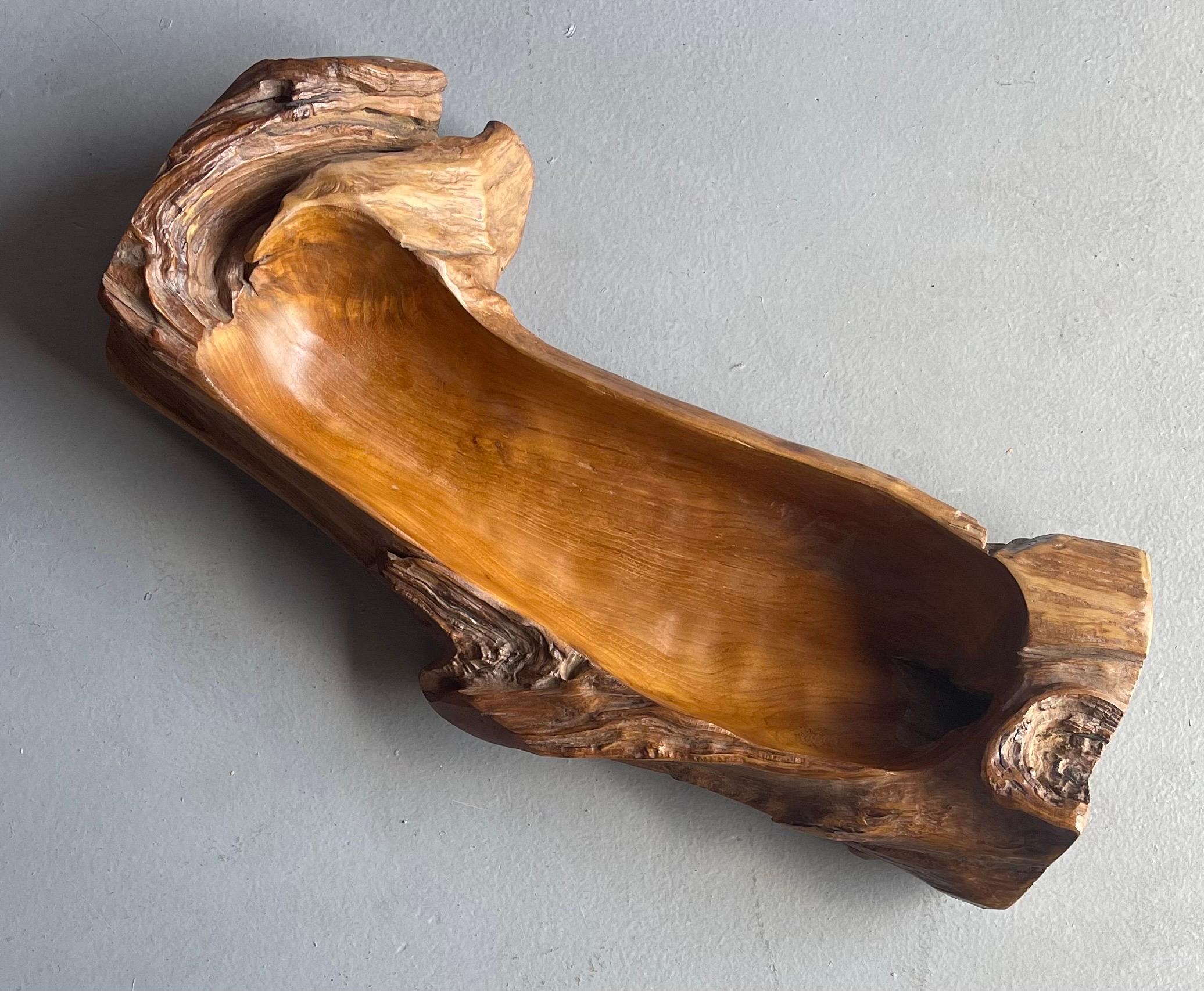 A gorgeous large natural teak freeform bowl, circa 1960s. The bowl has a great organic modern look and measures 24