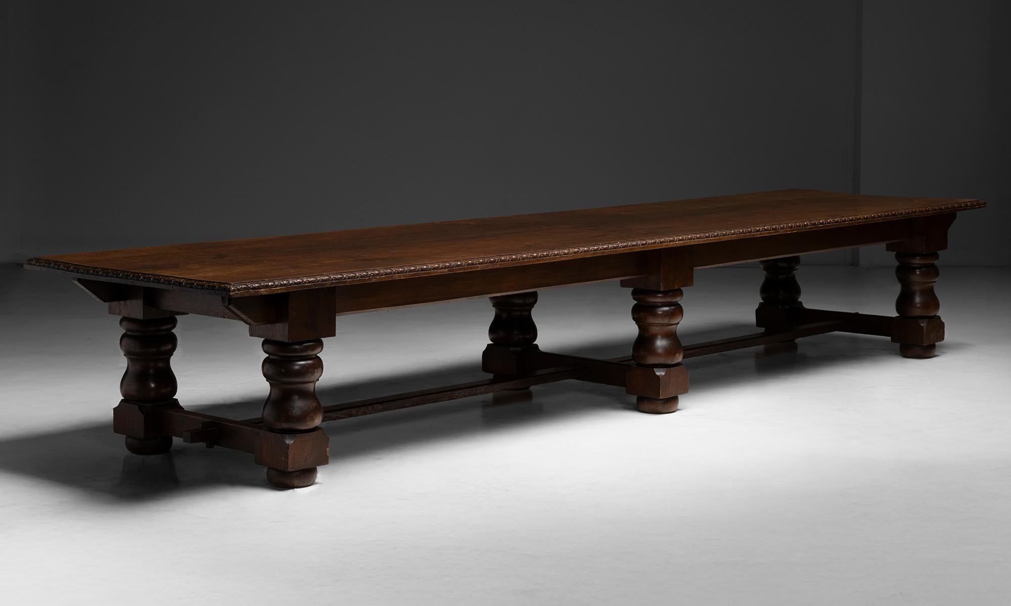 Massive Oak Dining Table
England, 1890
Long rectangular top with carved edge detailing, supported by bold baluster-turned legs and stretcher base.
193.5