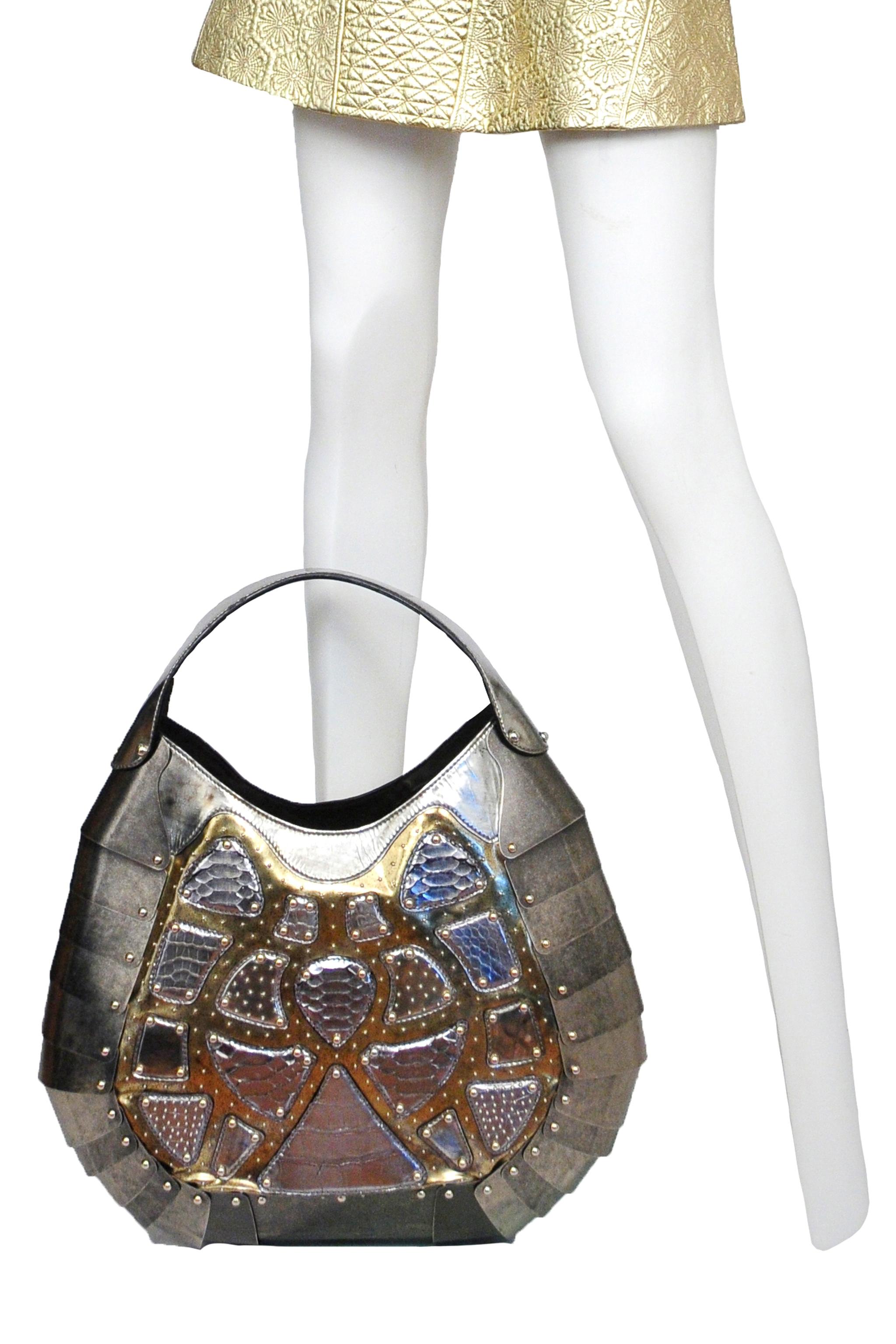 A highly rare and important one-of-a-kind silver exotic skins leather and tarnished silver colored metal giant scale handbag. In Memory Of Elizabeth How, Salem 1692 collection AW 2007. McQueen had bag made custom for and exhibition. The bag has only