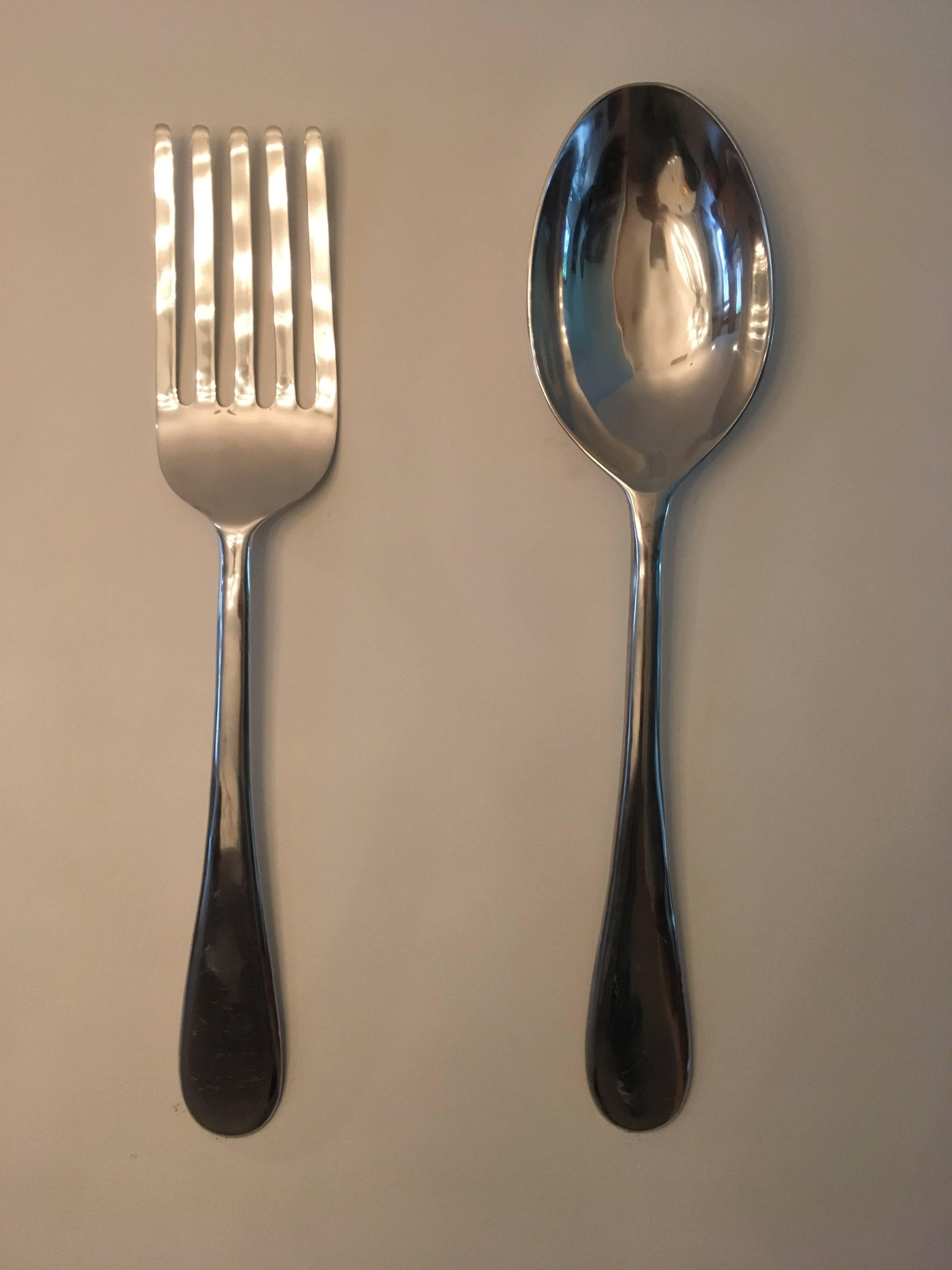 Interesting oversized fork and spoon made of heavy aluminium. Great sculptural objects. Sold as a set.