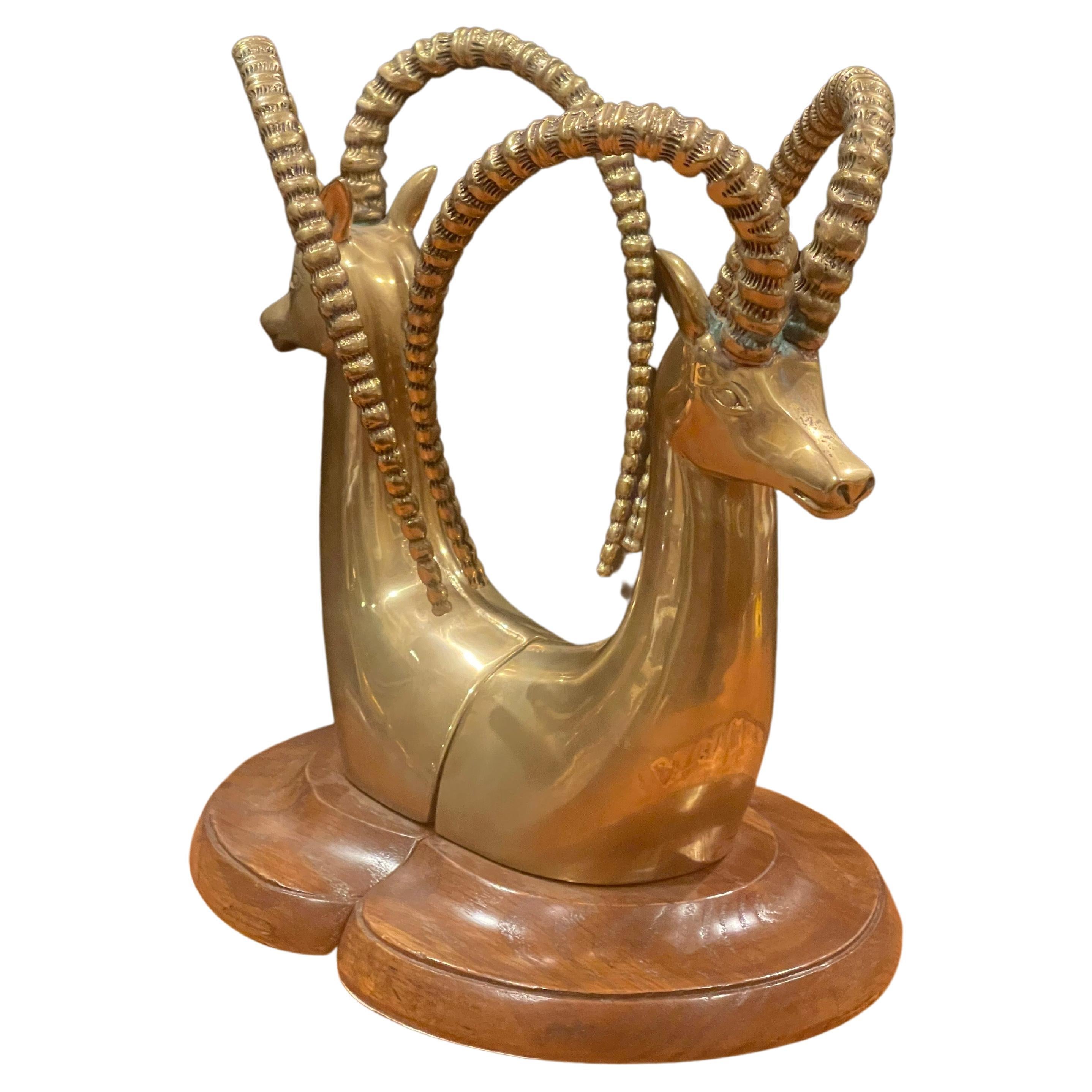 Massive Pair of Brass on Walnut Base Rams Head Bookends by Sarreid For Sale