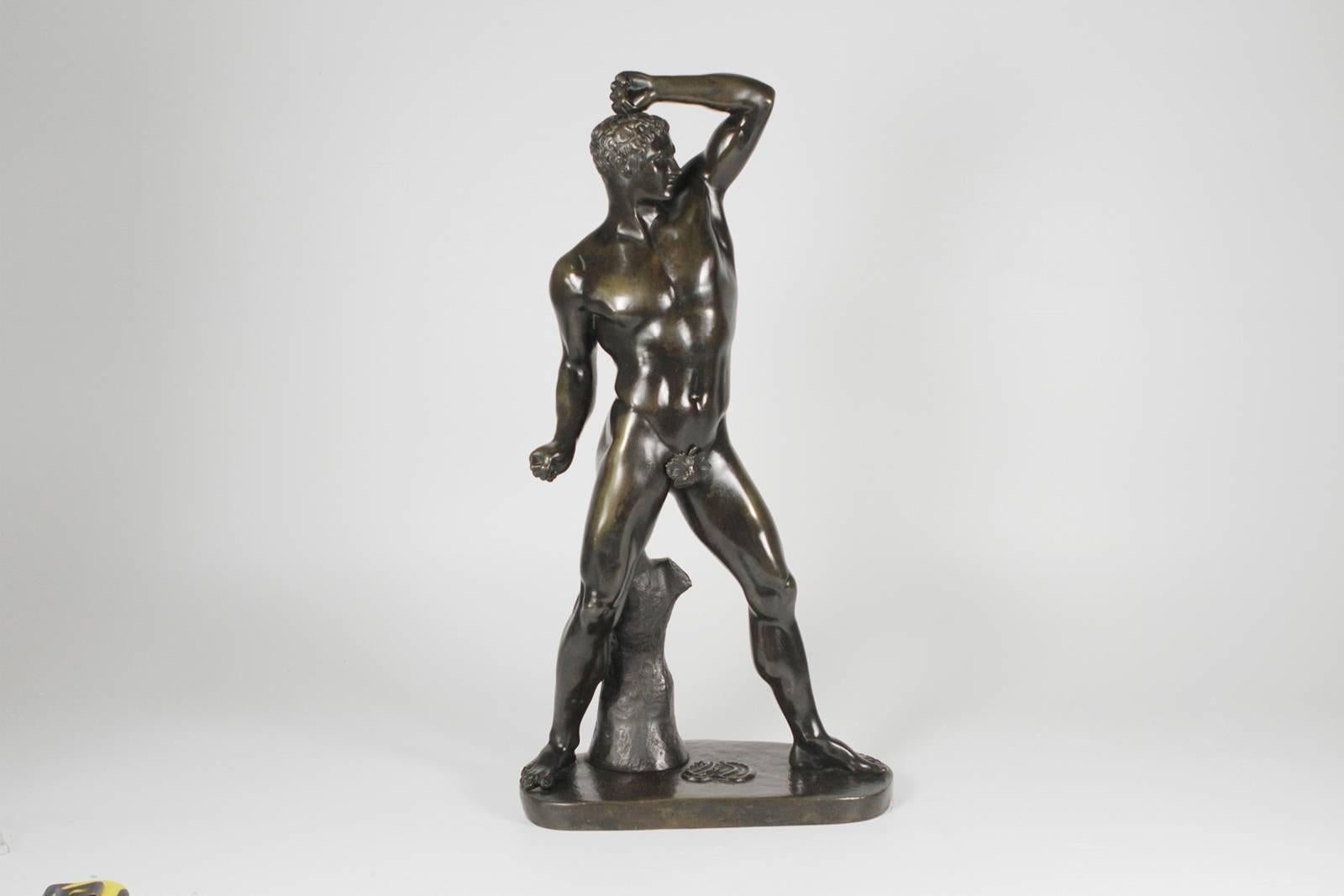 A large pair of patinated bronze boxing figures after Canova, Italy. The figures are of Cregugas and Damoxenos in boxing repose, each one reqalistically cast and retains its original finish. 
The legend is shown here as the two pugilists, named