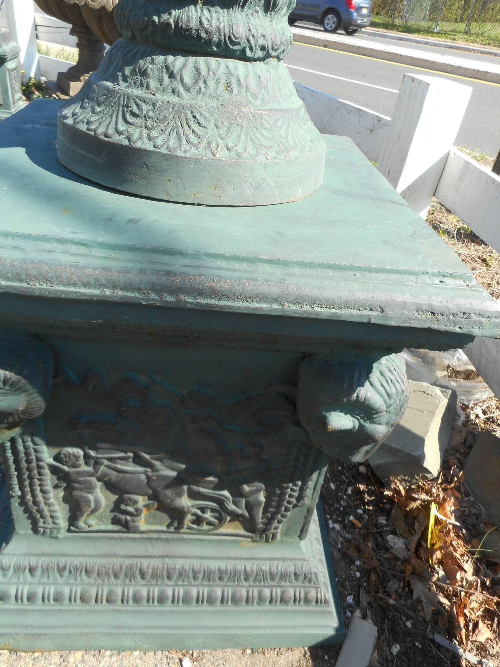 Massive Pair of Cast Iron Urns on Pedestal Bases 1