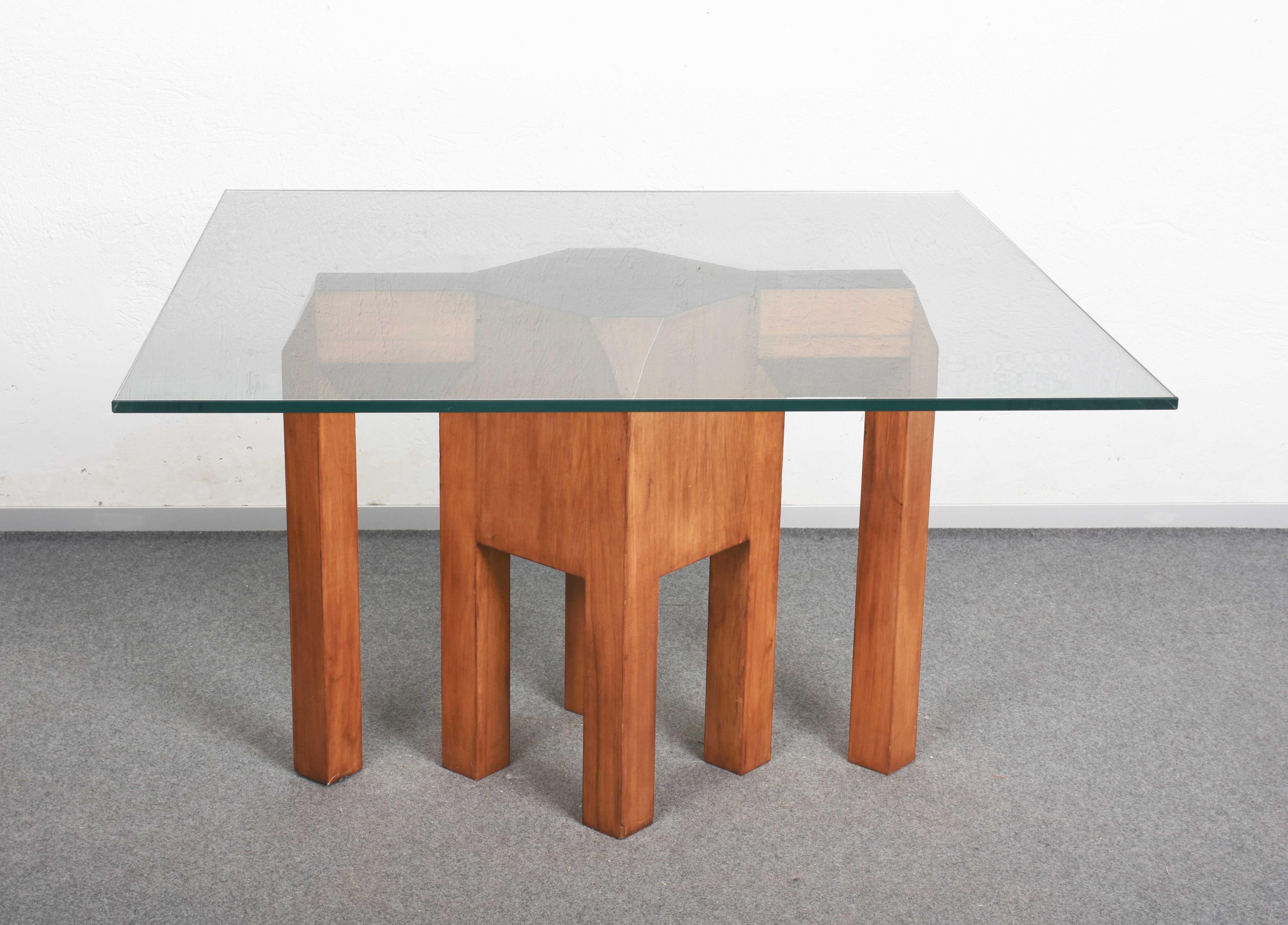 Striking pair of large architectural Italian table bases crafted from solid cherrywood, showcasing a charming geometric design with strong sculptural presence. This incredibly unique and elegant bases were designed in Italy during the 1970s.

Highly