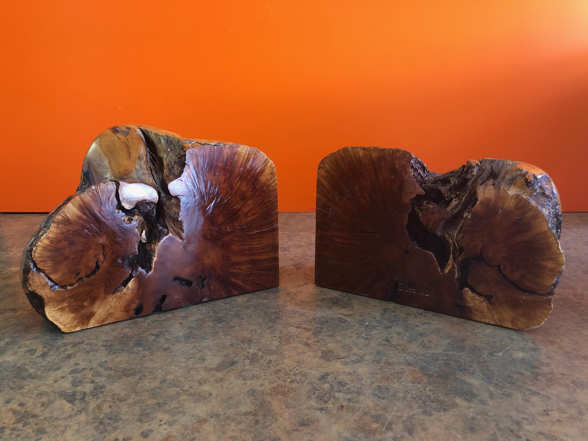 A very cool and unique pair of burl wood Bookends, circa 1960s. Wonderful colors and texture on these massive and heavy bookends; each one measures approximately 8.25