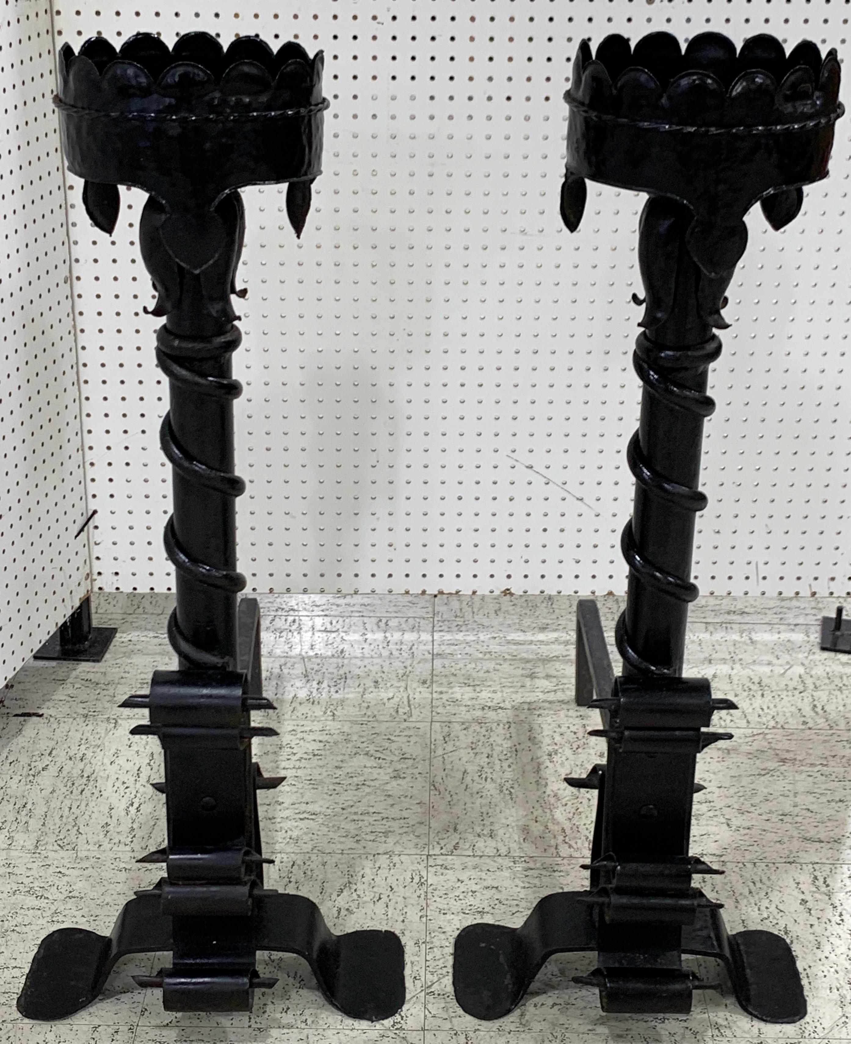 Massive pair of wrought iron Tudor style andirons, each one standing 41