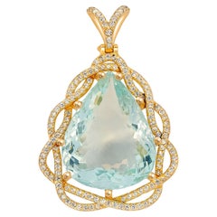 Colgante de aguamarina pera maciza y diamantes en oro de 18 quilates