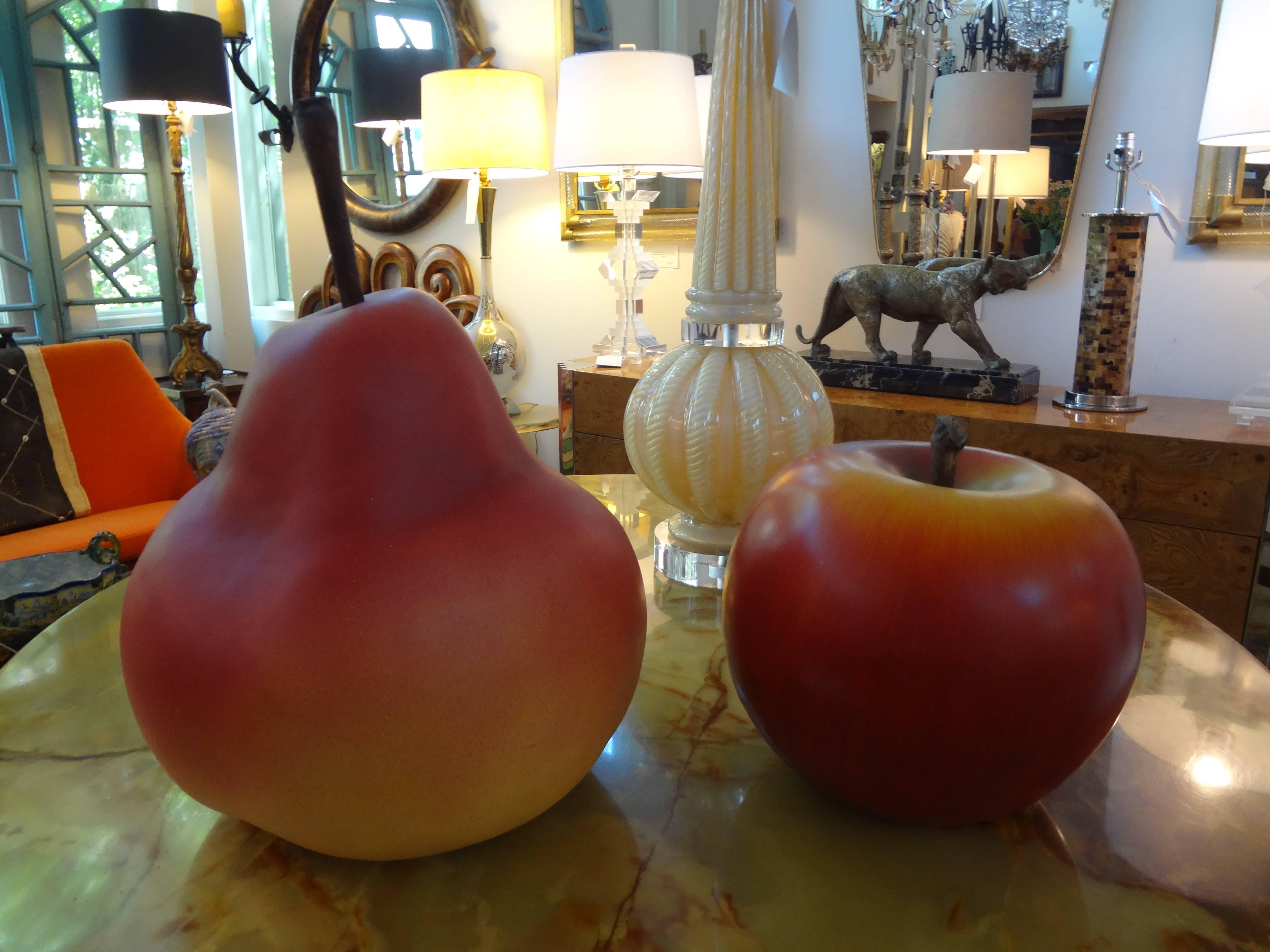 This collection of large Postmodern Pop Art ceramic fruit consists of a pear and an apple. These fruit sculptures are extremely realistic looking. The pear measures: 18