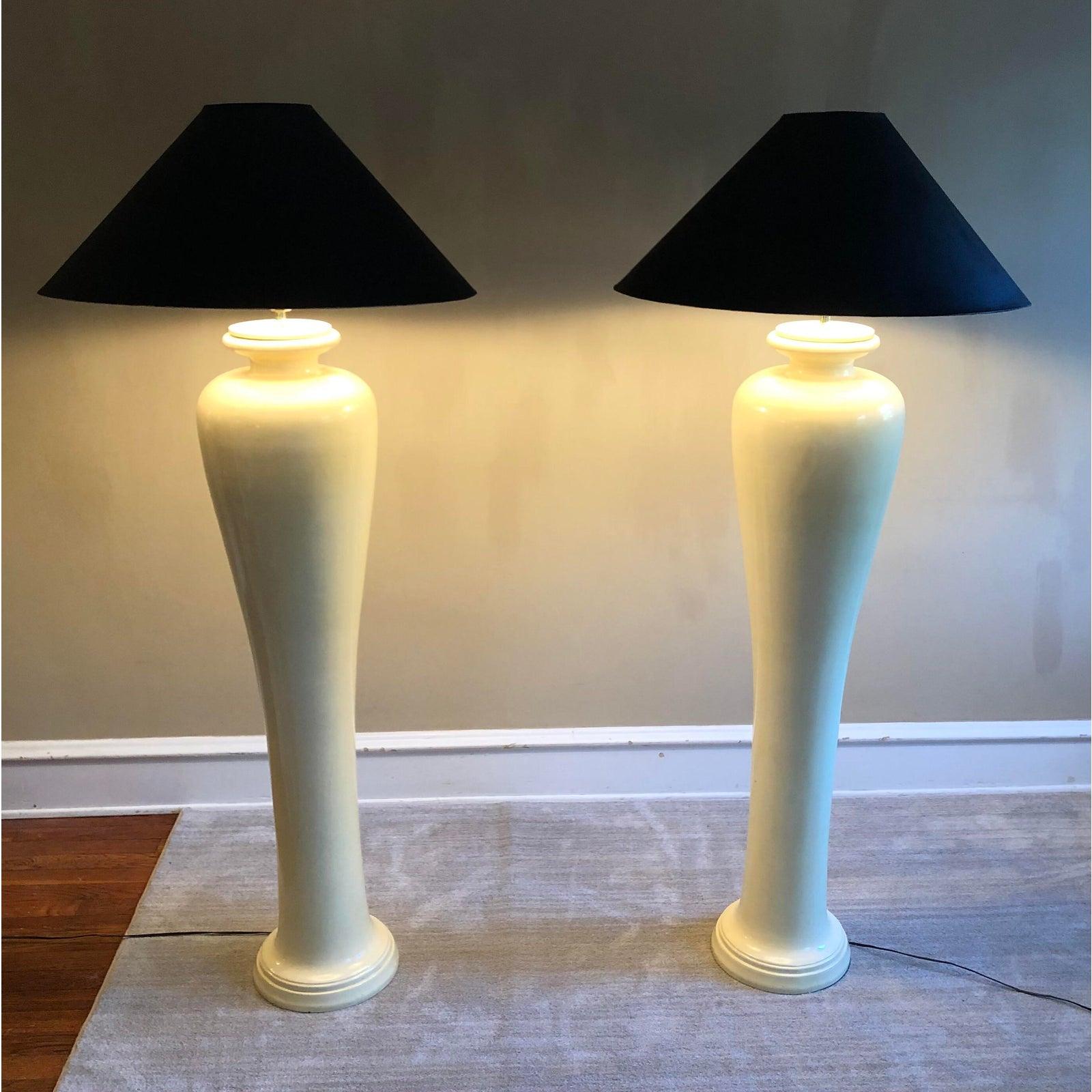 Huge 1980s floor lamps. Lacquered chalkware balustrade bases in a rich cream hue.
  