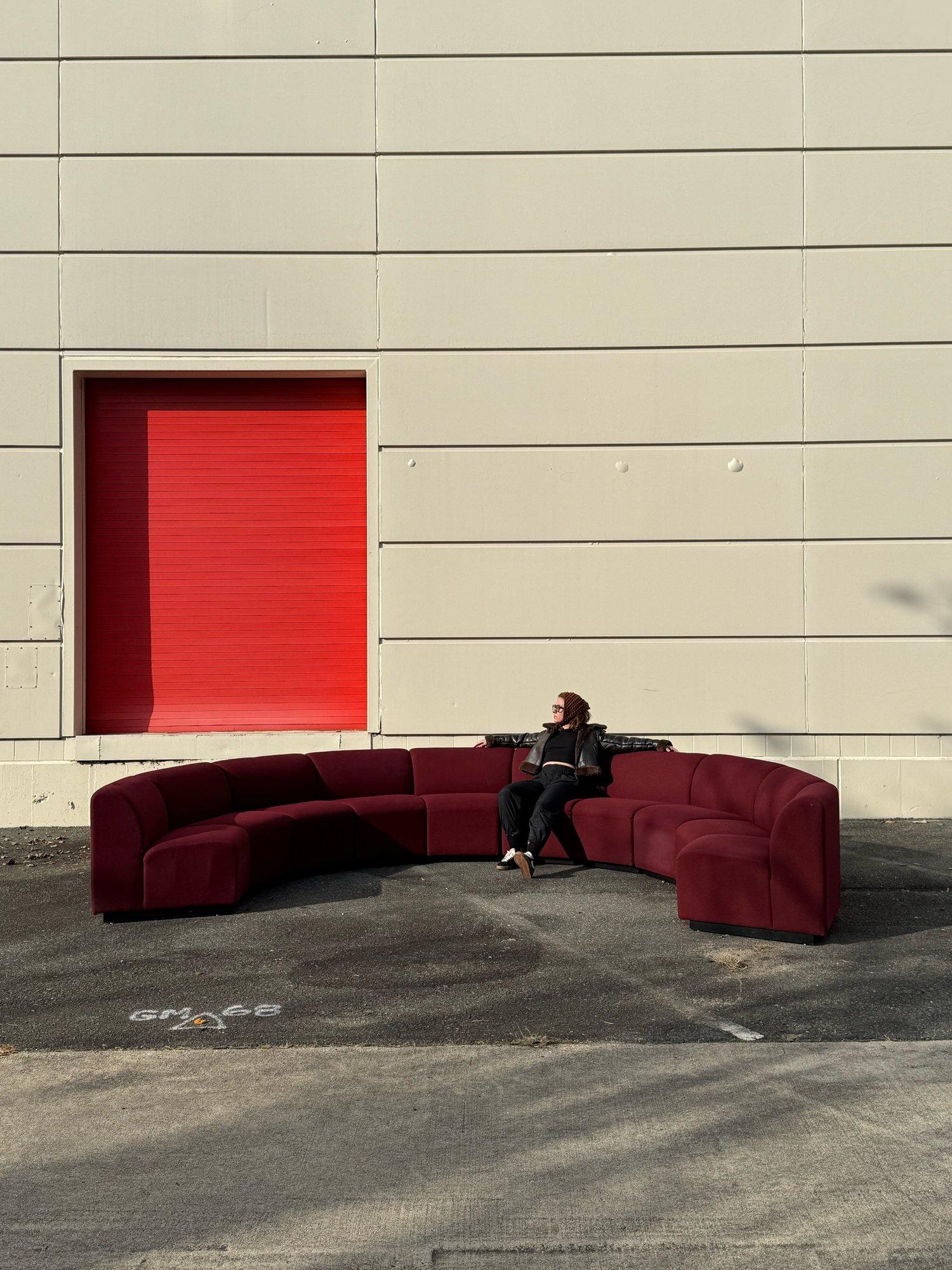 Massive postmodern modular sofa. Ten individual pieces that can be used in a variety of ways depending on your space. Keep separated for individual seating or push together to create a massive semi-circle sofa. Perfect for those in a home with a