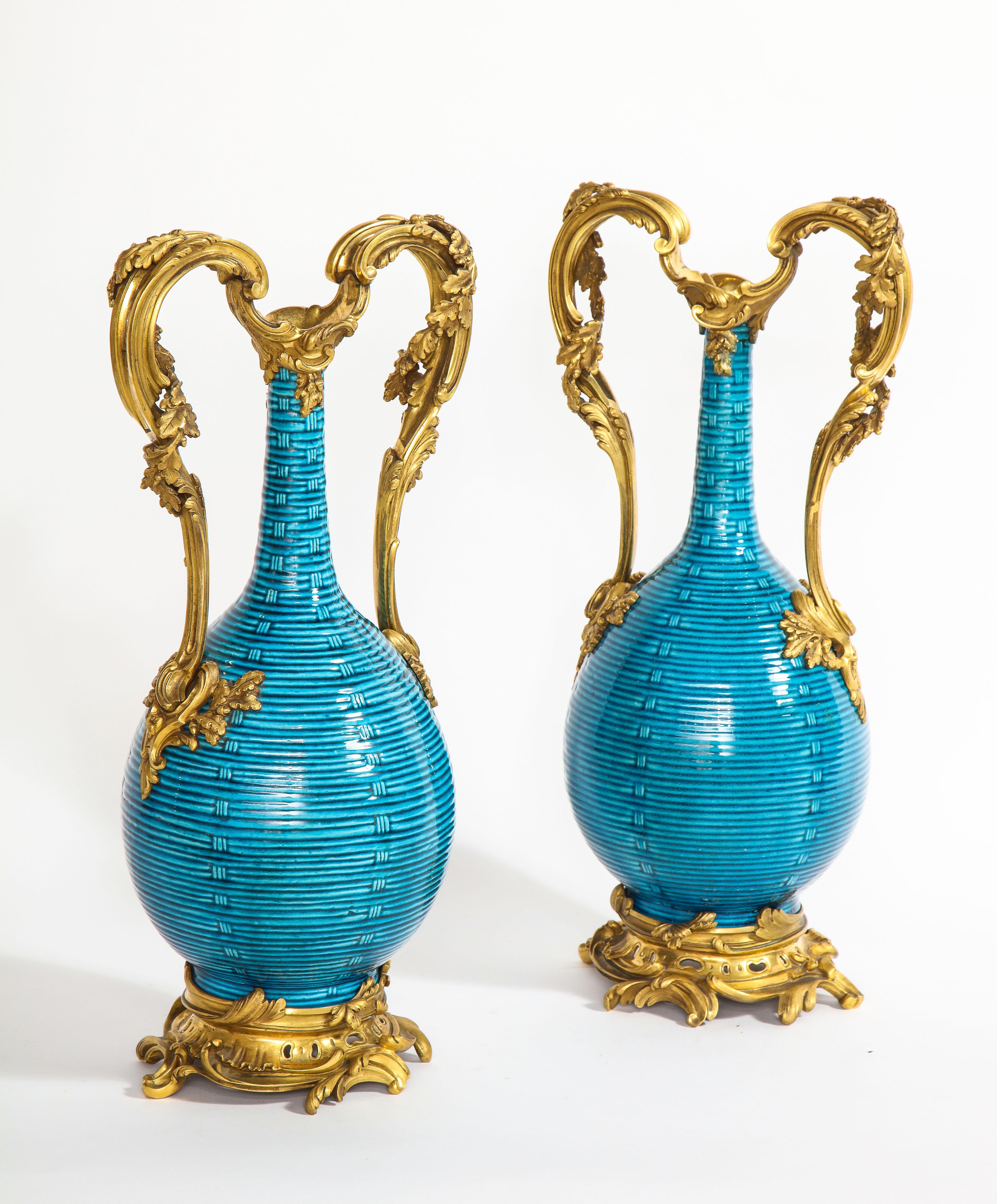 Hand-Carved Massive Pair of Chinese Turquoise Porcelain, French Dore Bronze Mounted Vases For Sale