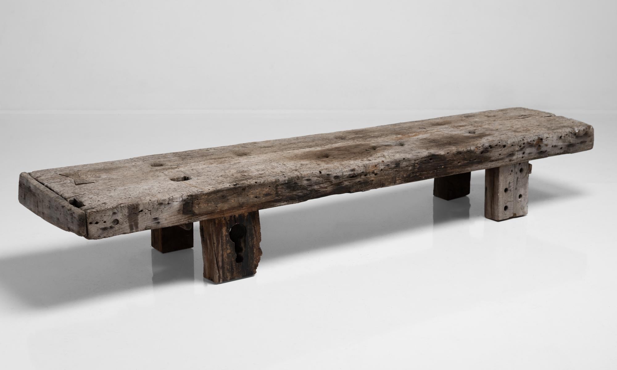 Massive Primitive coffee table, France, circa 1880.

Thick plank aged pine coffee table. Worn surface.