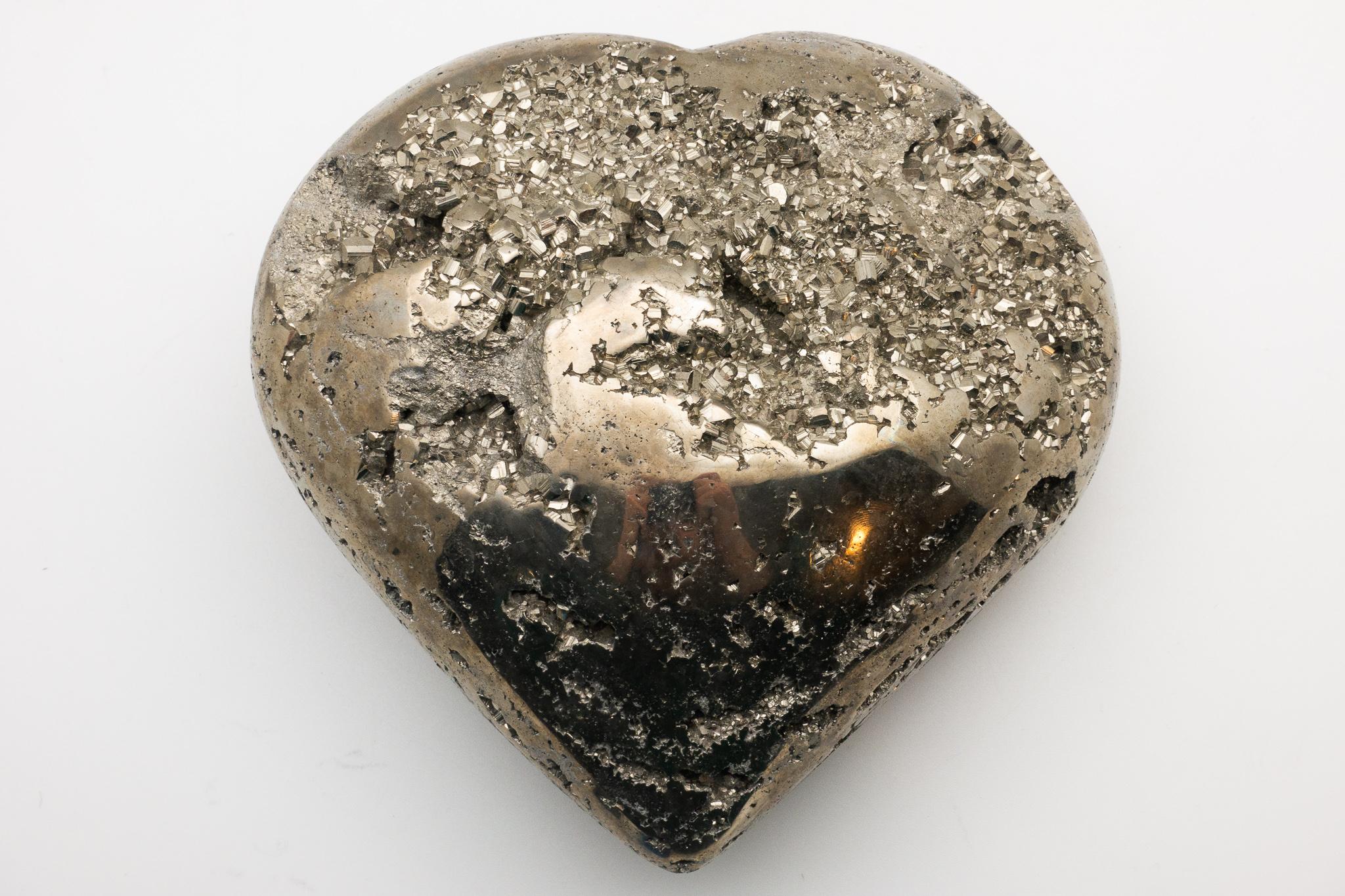 Beautifully carved extra large pyrite specimen from Peru. Pyrite is a symbol of prosperity and good luck. The ideal gift for Valentines Day- Love, prosperity and good luck.