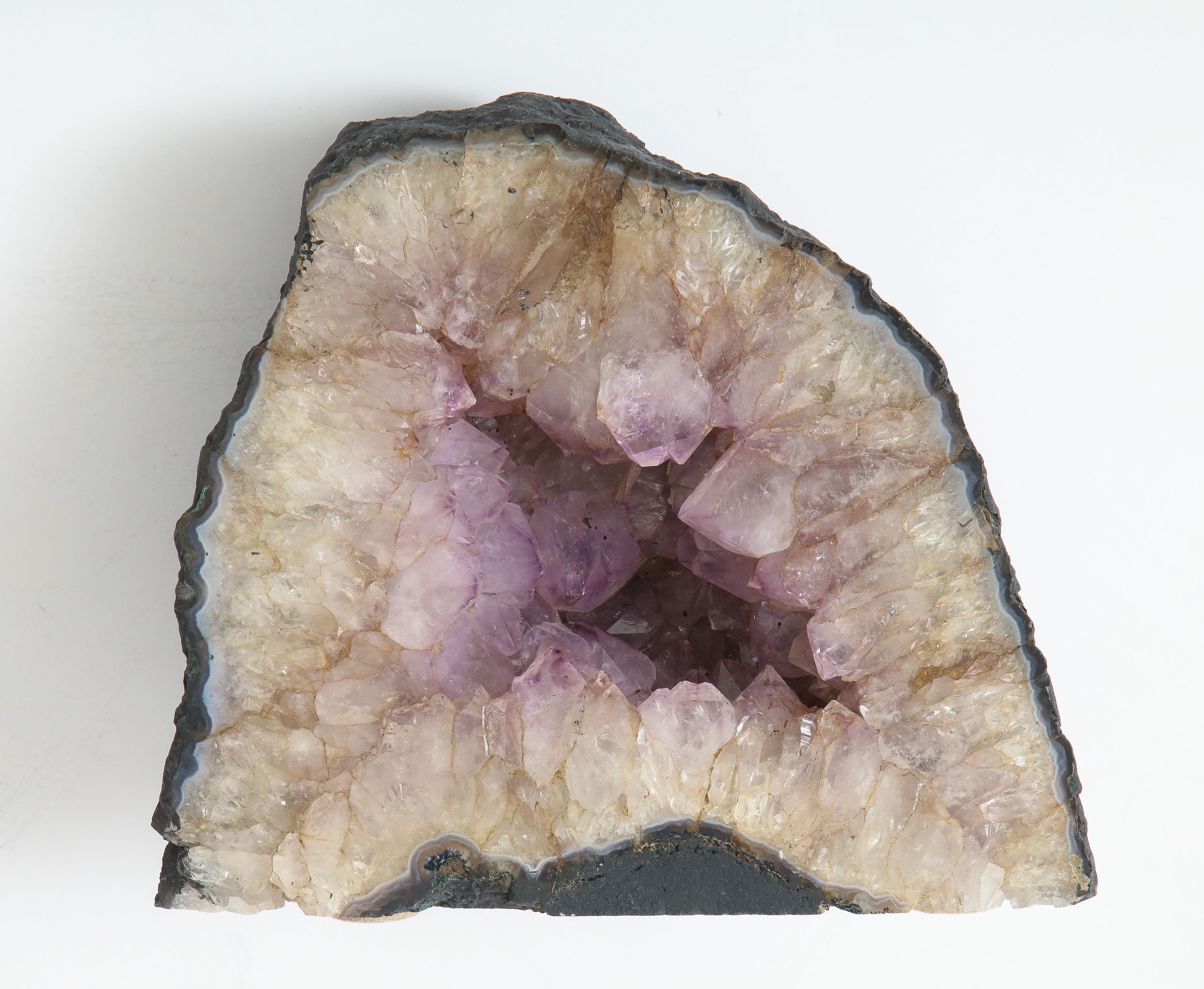 Superb quartz trranslucent crystal specimen with an Amethyst center.