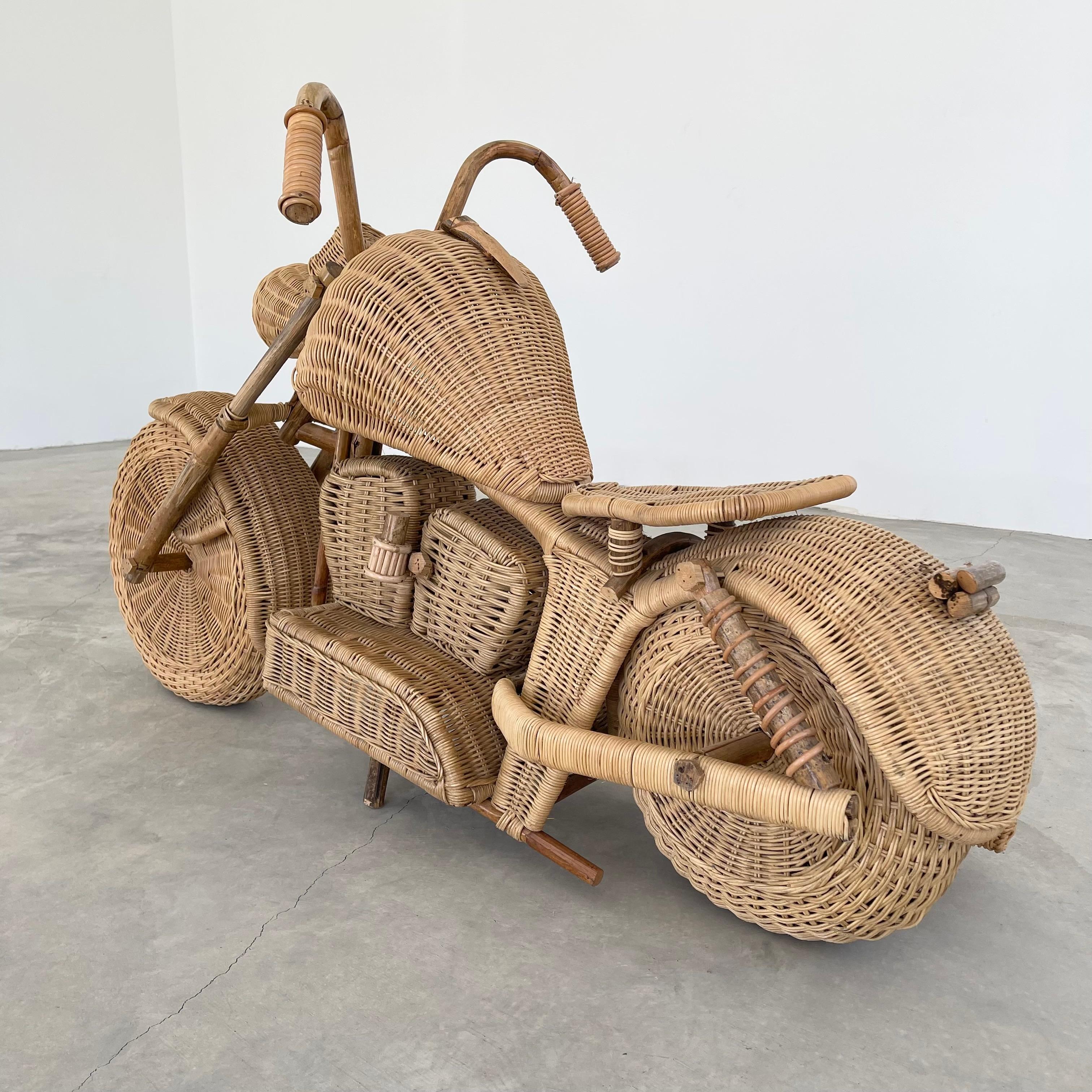 Great sculptural motorcycle made attributed to the Tom Dixon stores in the 1980s. Made of rattan, wicker and bamboo. Hand-made. Spectacular detail throughout on handlebars, wheels, gas tank, exhaust, seat etc. Super cool sculpture. Great scale. Wear
