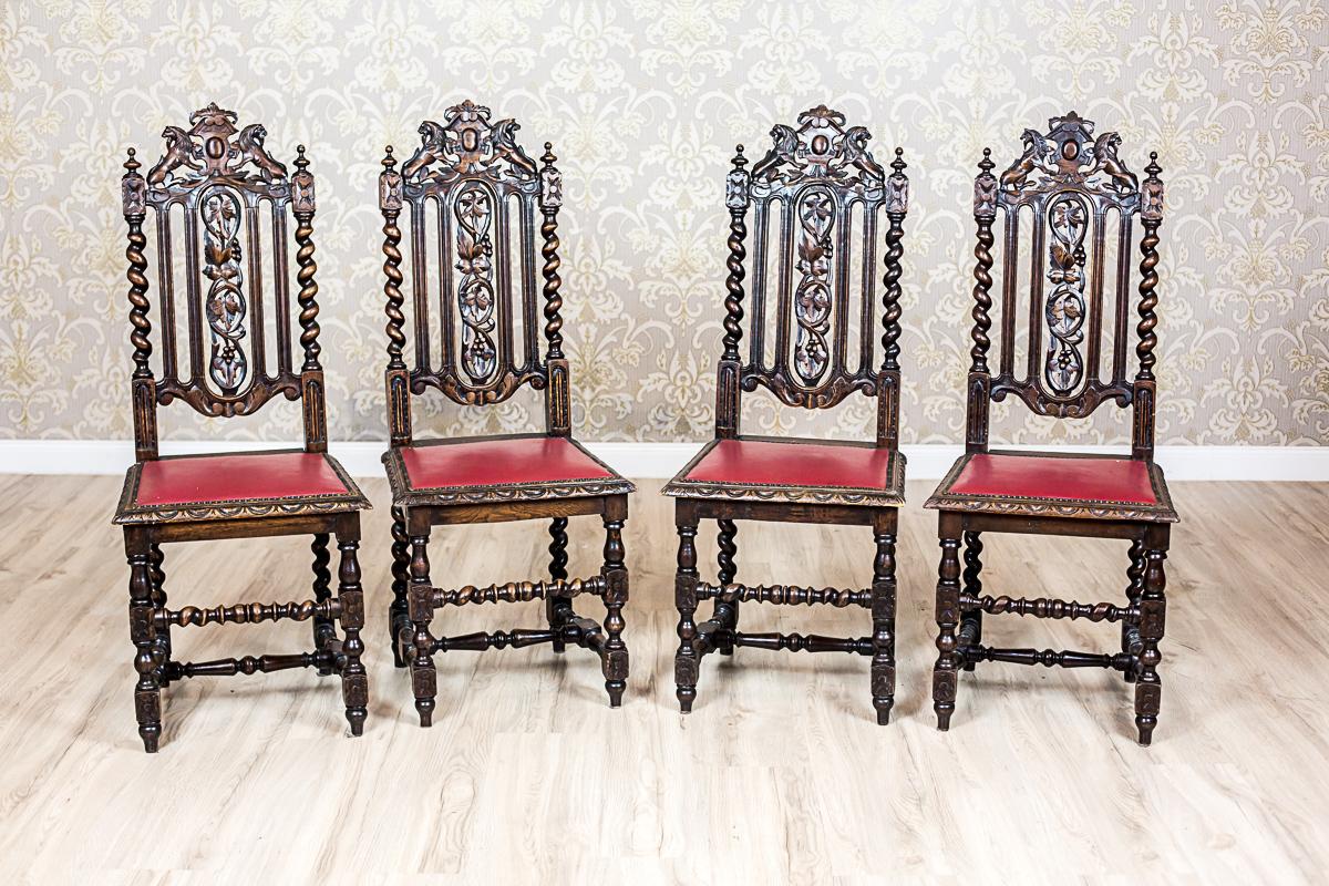 We present you four chairs, circa 1890, made of walnut wood.
The backrest is high, composed of spiral side rails that end with finials.
The back splat with an openwork, semi-plastic woodcarving, and vertical, straight boards on both side of the