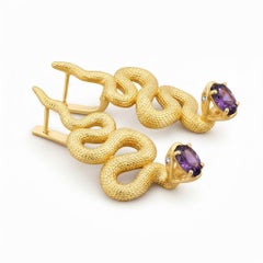 Massive snake earrings with amethysts, silver, gold