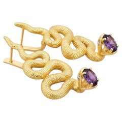 Massive snake earrings with amethysts, silver, gold