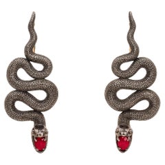 Orecchini con serpente massiccio e rubini