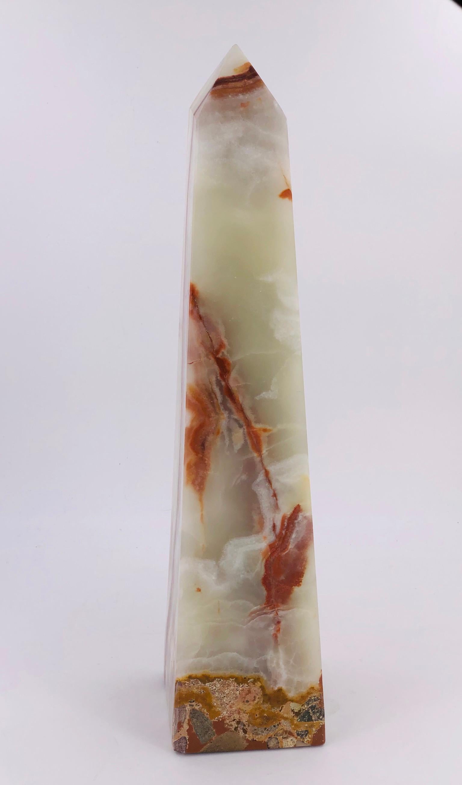 Beautiful solid onyx decorative obelisk, perfect condition no chips or cracks nicely polished. Tall and impressive every side it's different.