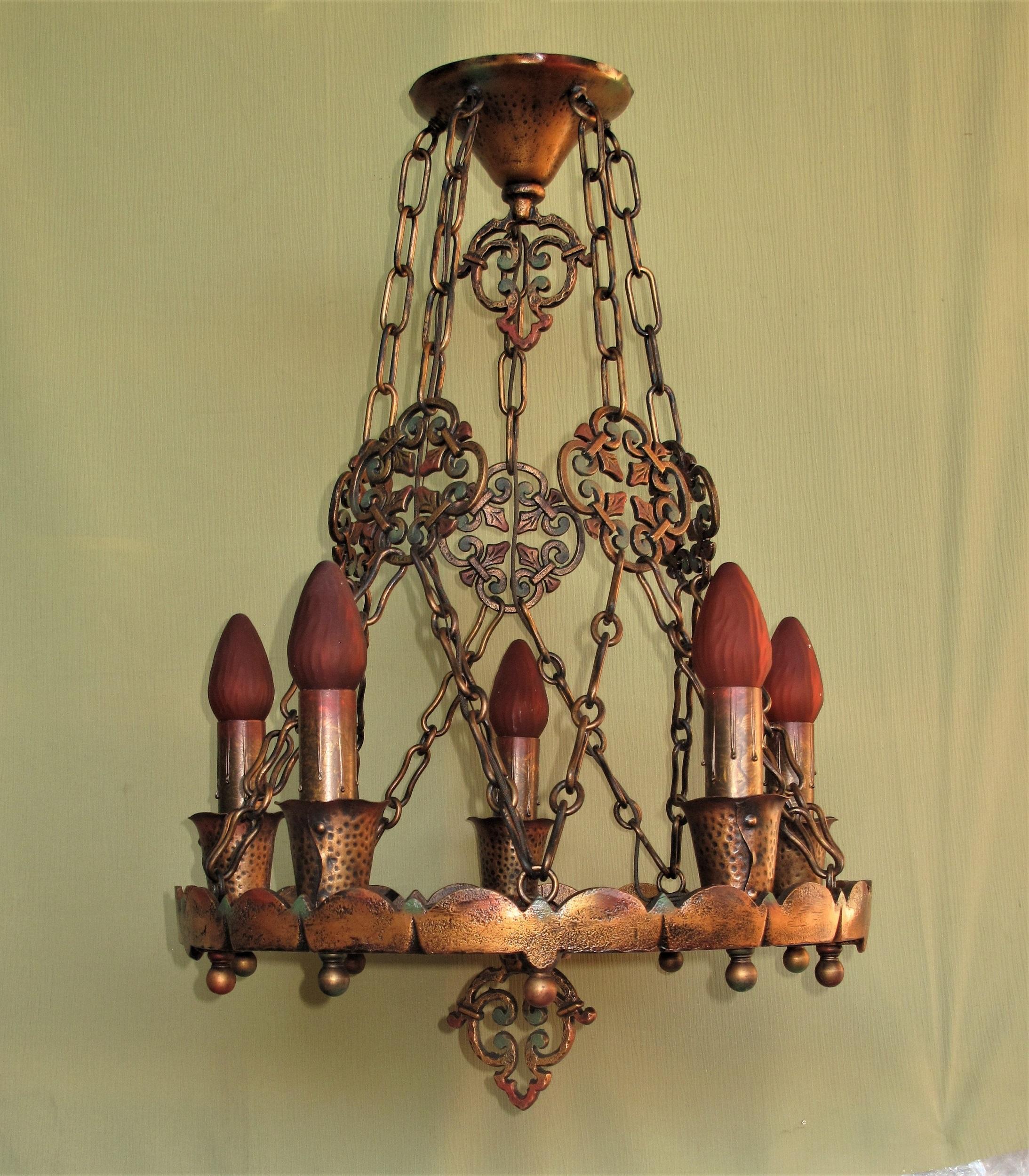 Priced for the set of single chandelier and four sconces.
Attributed to Feldman Co. Los Angeles, circa 1920.
Both chandelier and sconces are cast iron and have been refinished to match original colors. Refinishing included taking the fixtures down