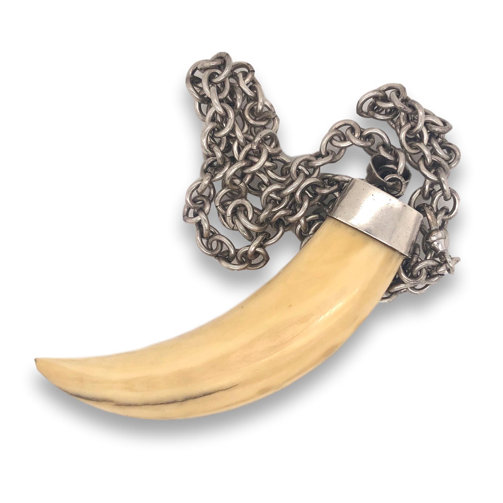 70's Boars tusk bone pendant necklace. The large 4