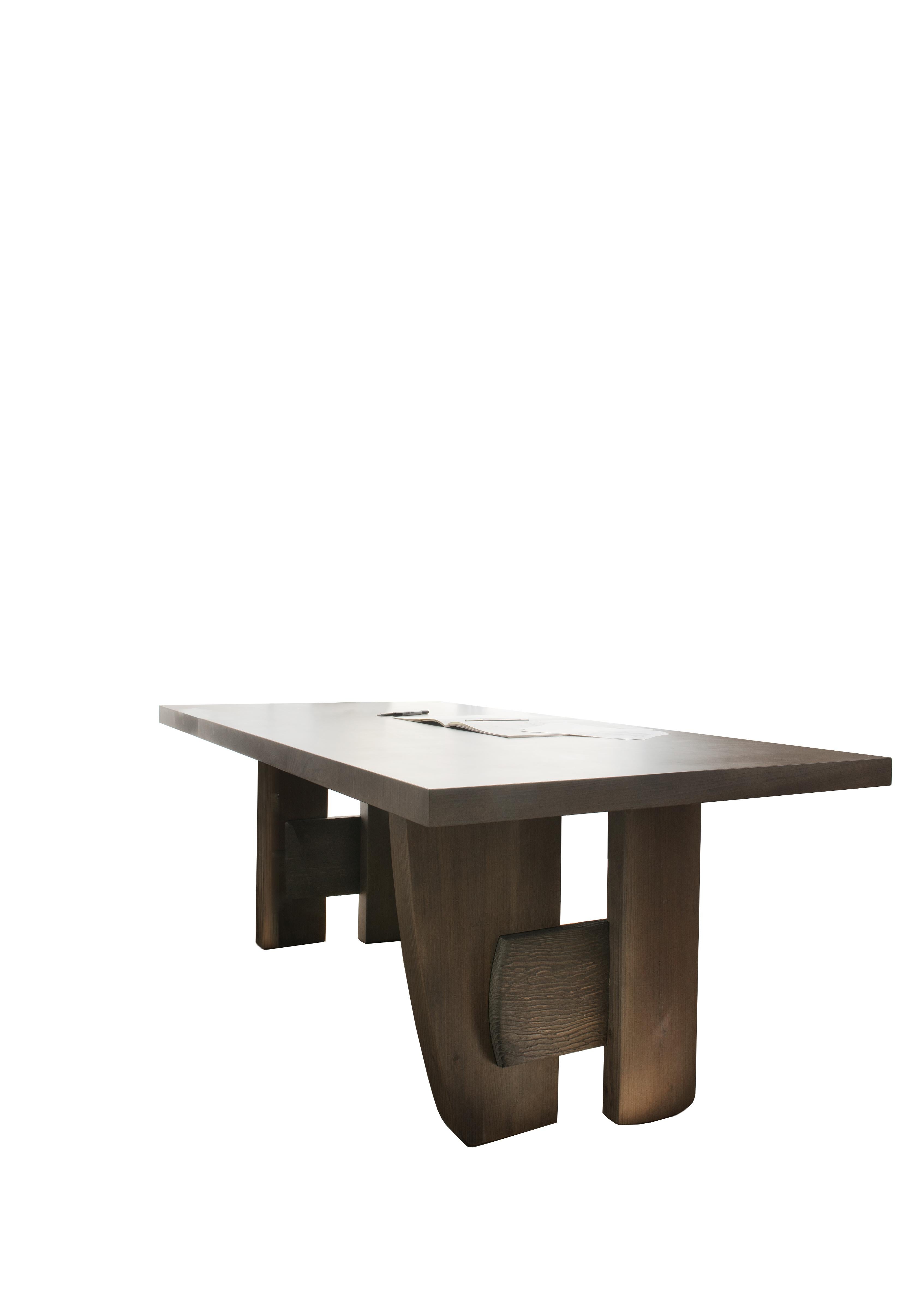 Massive table by Charlotte Besson-Oberlin
Dimensions: 100 x 190 x 72 cm
Materials: Cedar Wood

Hand made in France

A table with sculpted feet like two revisited trestles. Top in smooth tinted cedar, 2-part base in smooth tinted sculpted