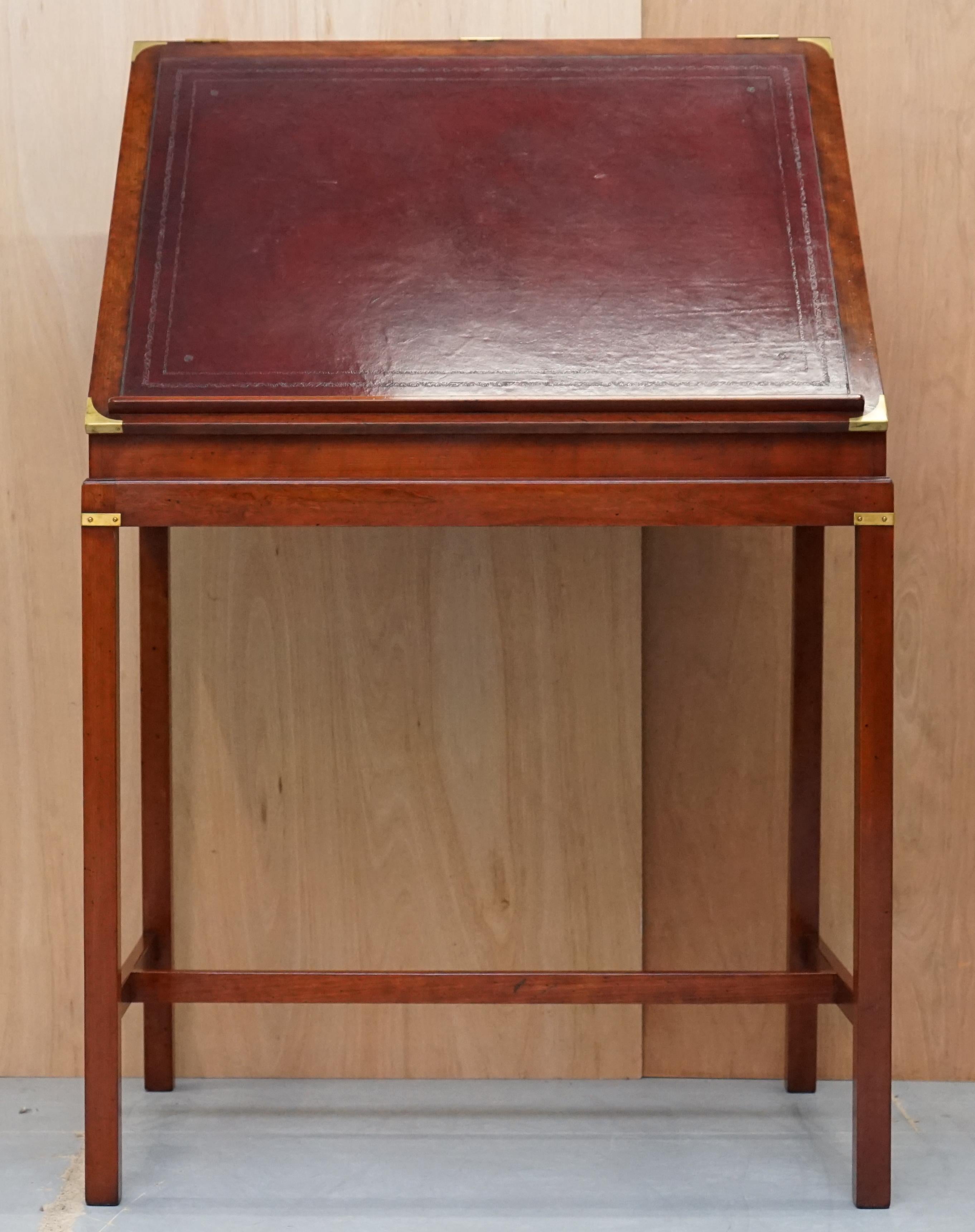 We are delighted to offer for sale this very rare one of a kind custom made to order from Kennedy Furniture retailed through Harrods London for £6000 Architects standing desk with oxblood leather writing surface in the Military Campaign style

A
