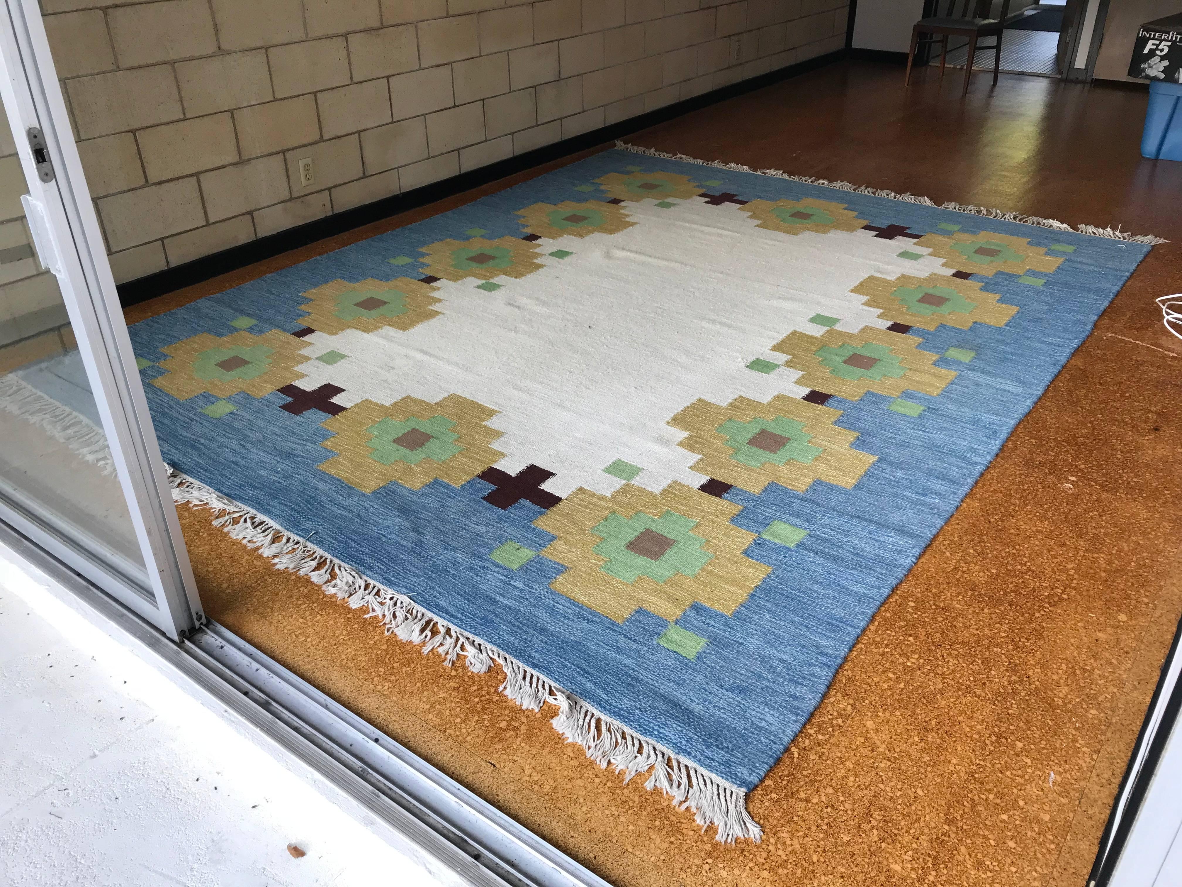 Beautiful massive area rug by Indian cottage industries (a group of small craftsman in India that produced under this company) reminiscent of a Navajo pattern - this rug came from a beautiful modernist residence in Indiana that was owned by art