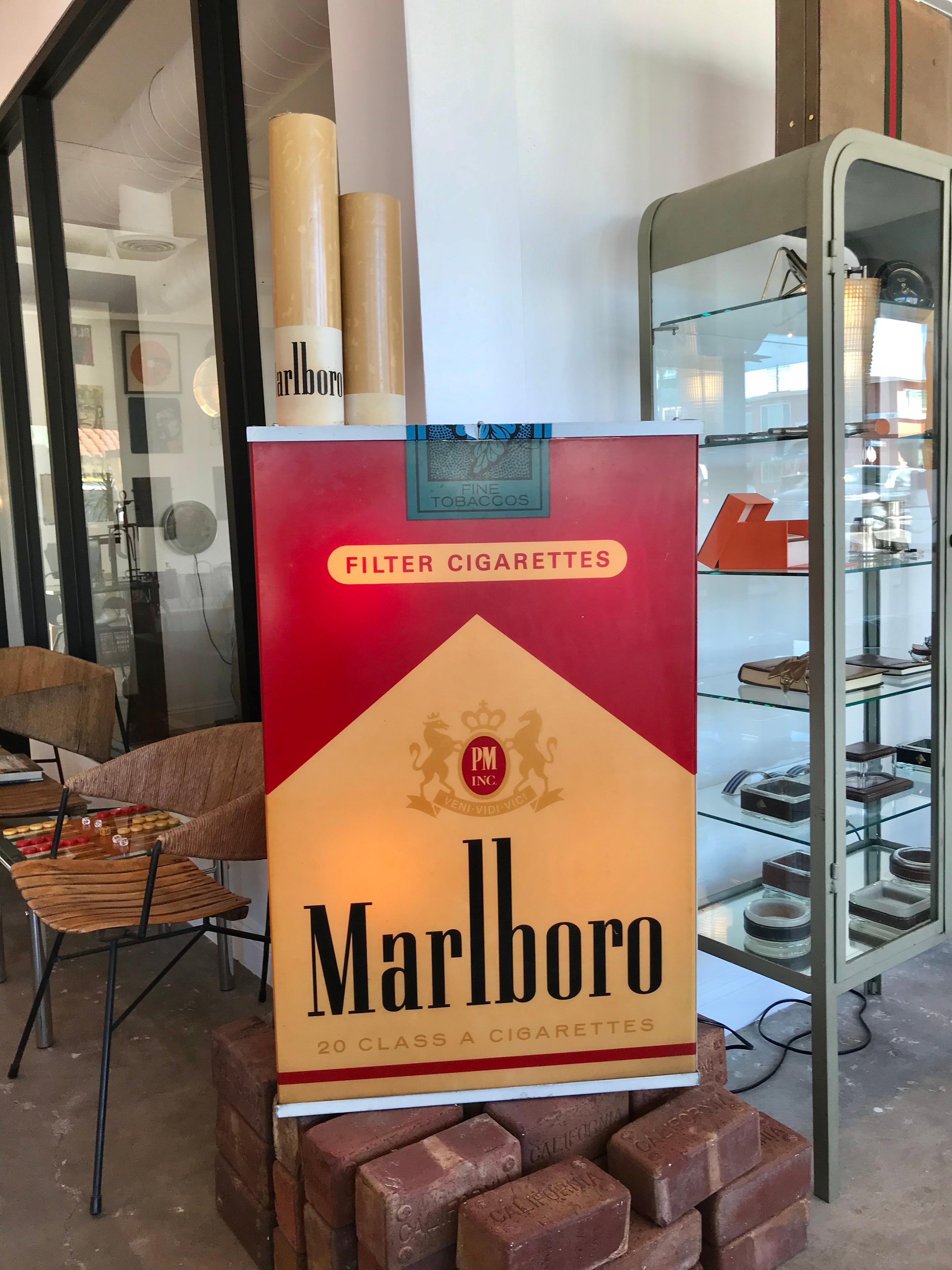 Fantastic vintage advertising light up box by Marlboro. Massive scale. Looks great hanging on the wall or on the ground. Acrylic sides and cigarettes with metal frame. Electrical works perfectly. Looks good on or off. Great piece of pop art!
